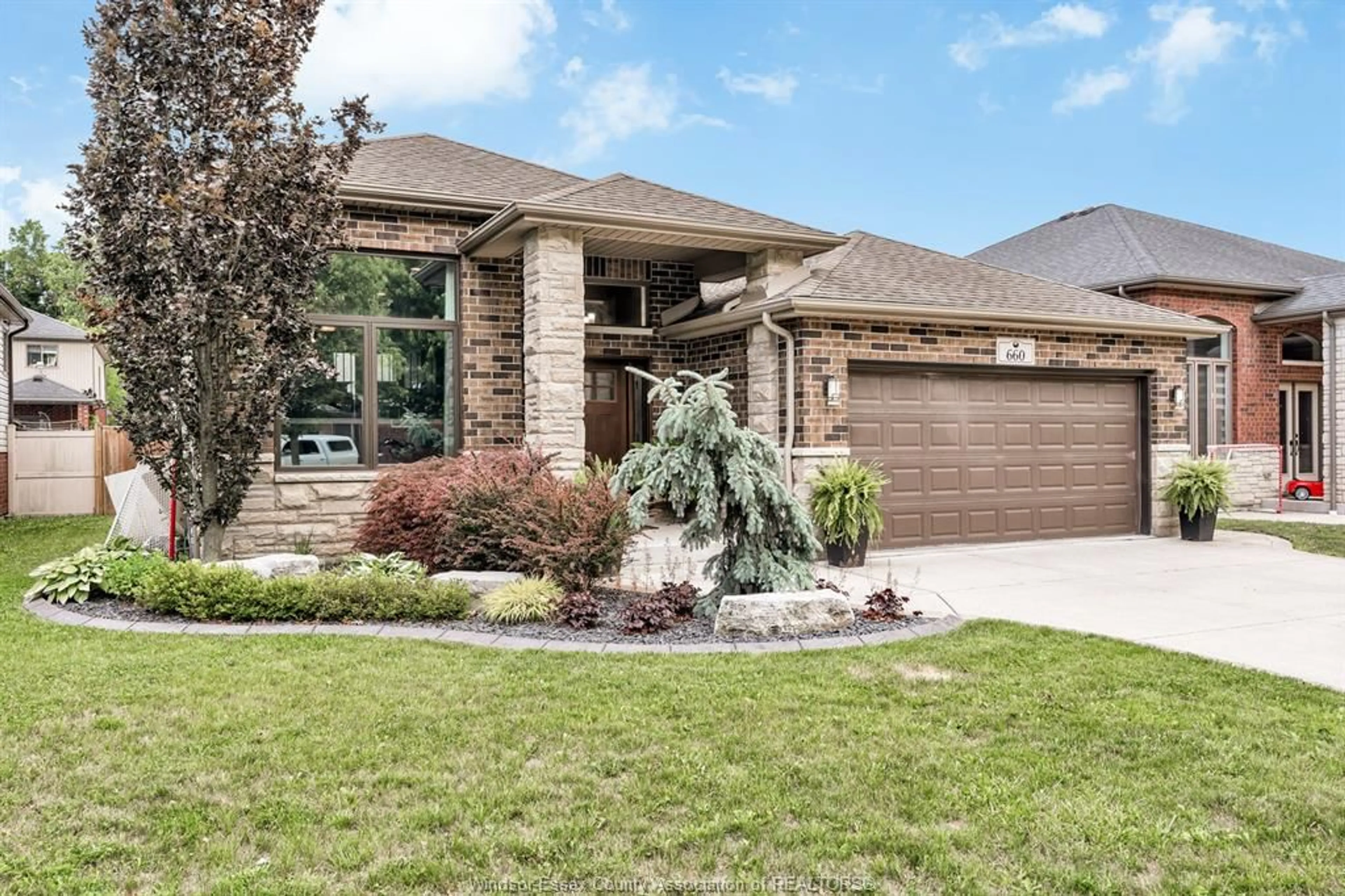 Home with brick exterior material, street for 660 INTERNATIONAL Ave, LaSalle Ontario N9J 0A5