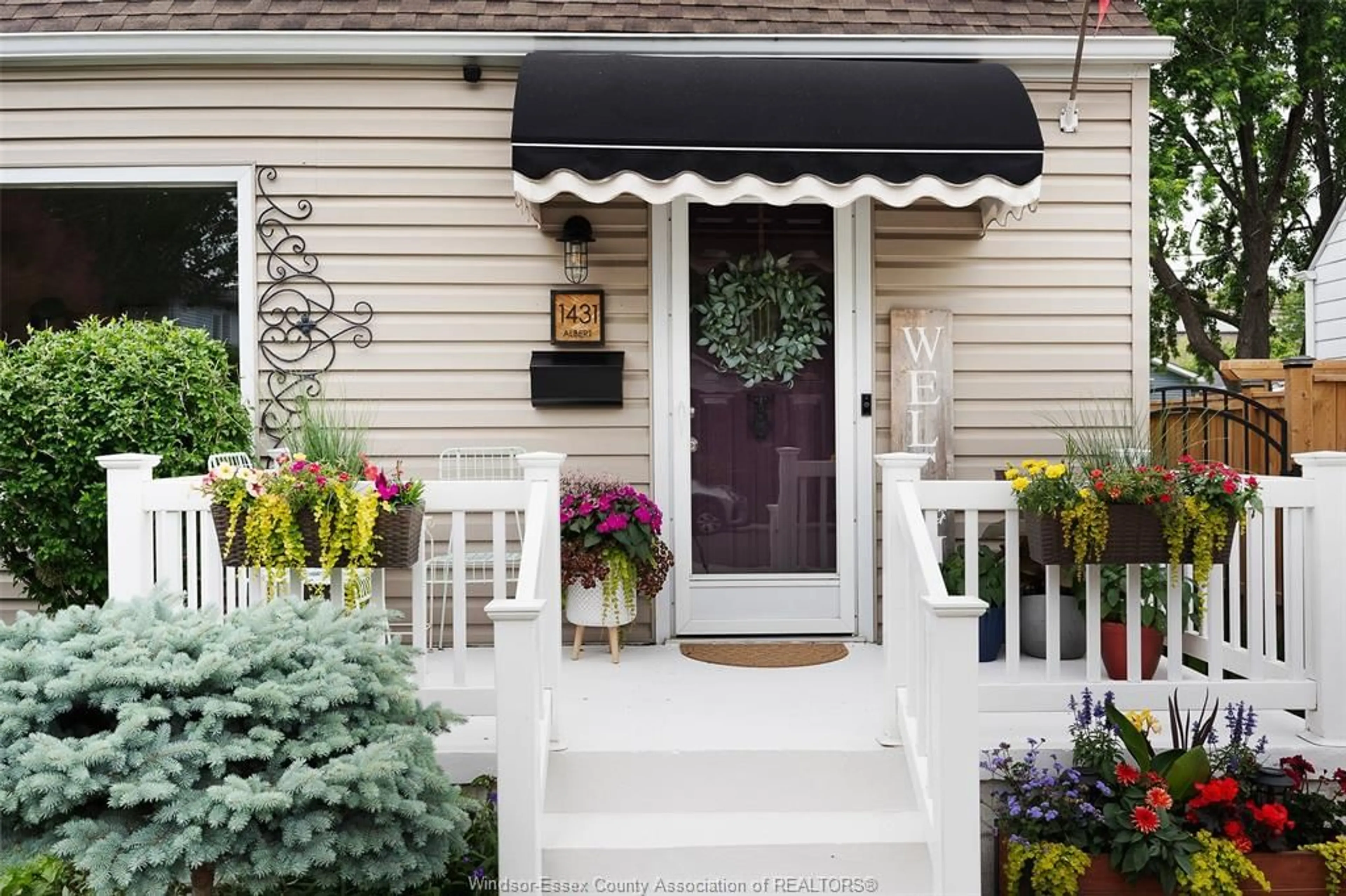 Home with vinyl exterior material, street for 1431 Albert Rd, Windsor Ontario N8Y 3R1