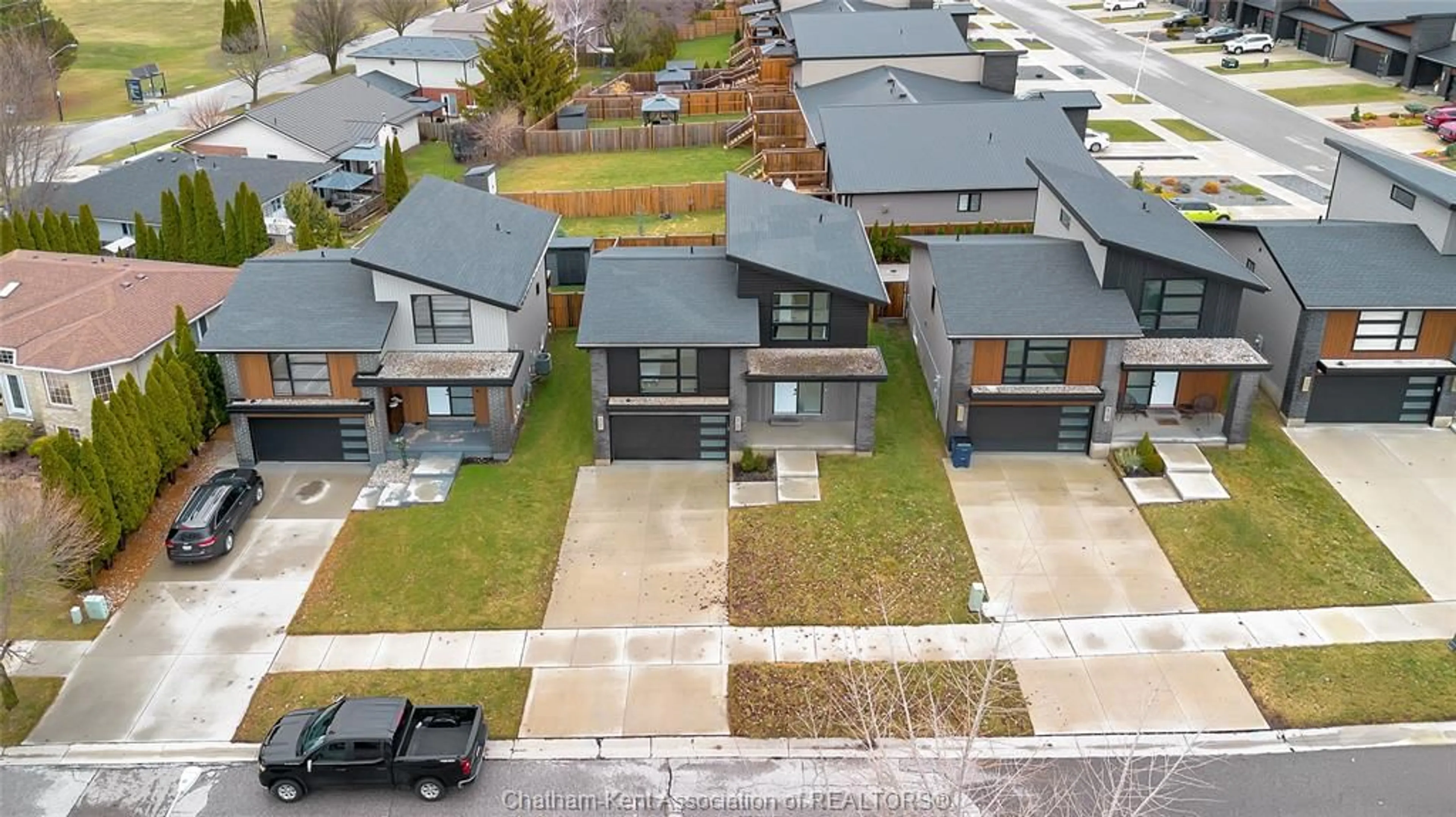 A pic from outside/outdoor area/front of a property/back of a property/a pic from drone, street for 15 Churchill Park Rd, Chatham Ontario N7M 6M2