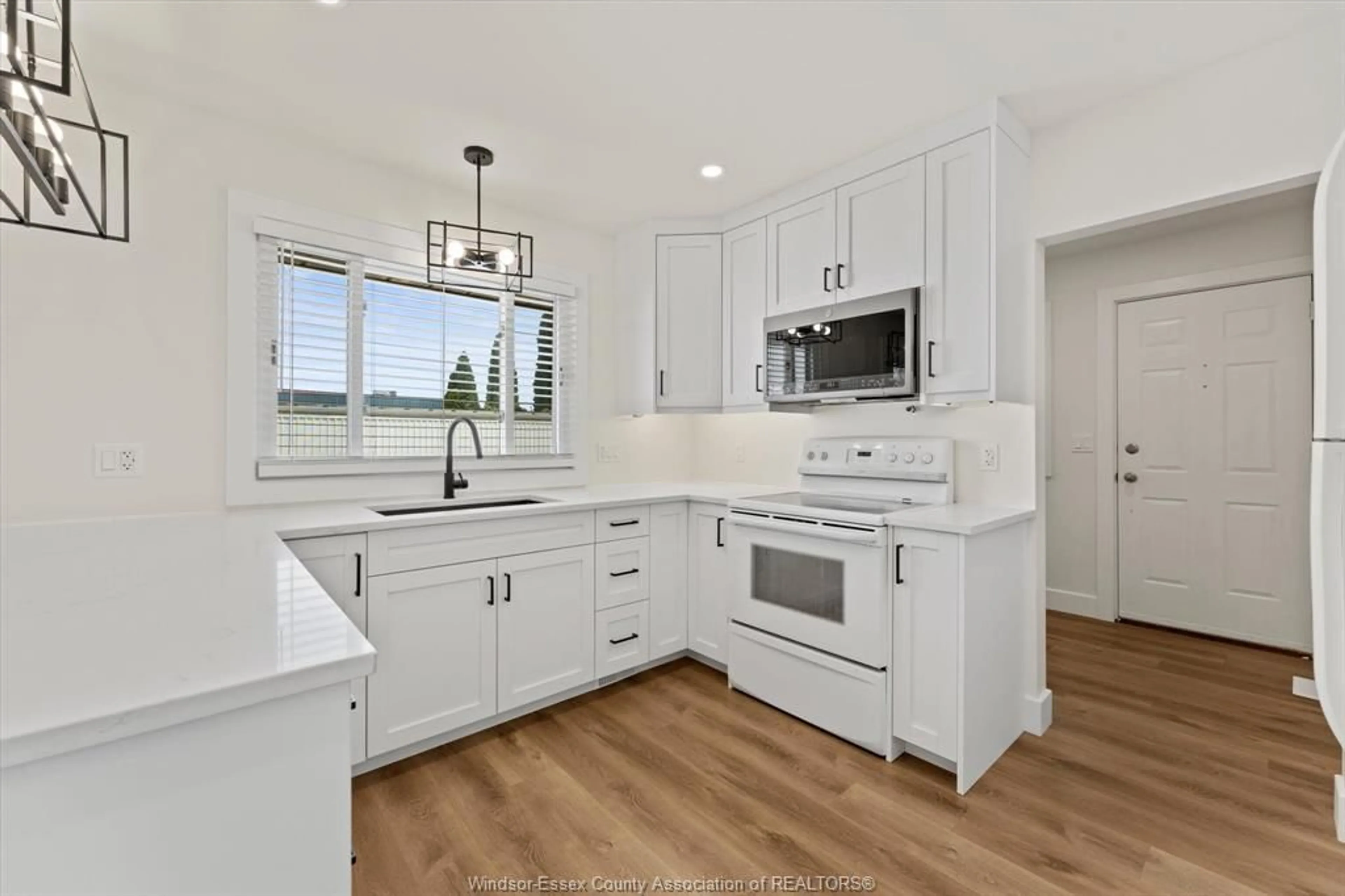 Open concept kitchen, ceramic/tile floor for 2035 PENANG Lane, Windsor Ontario N8R 1R7