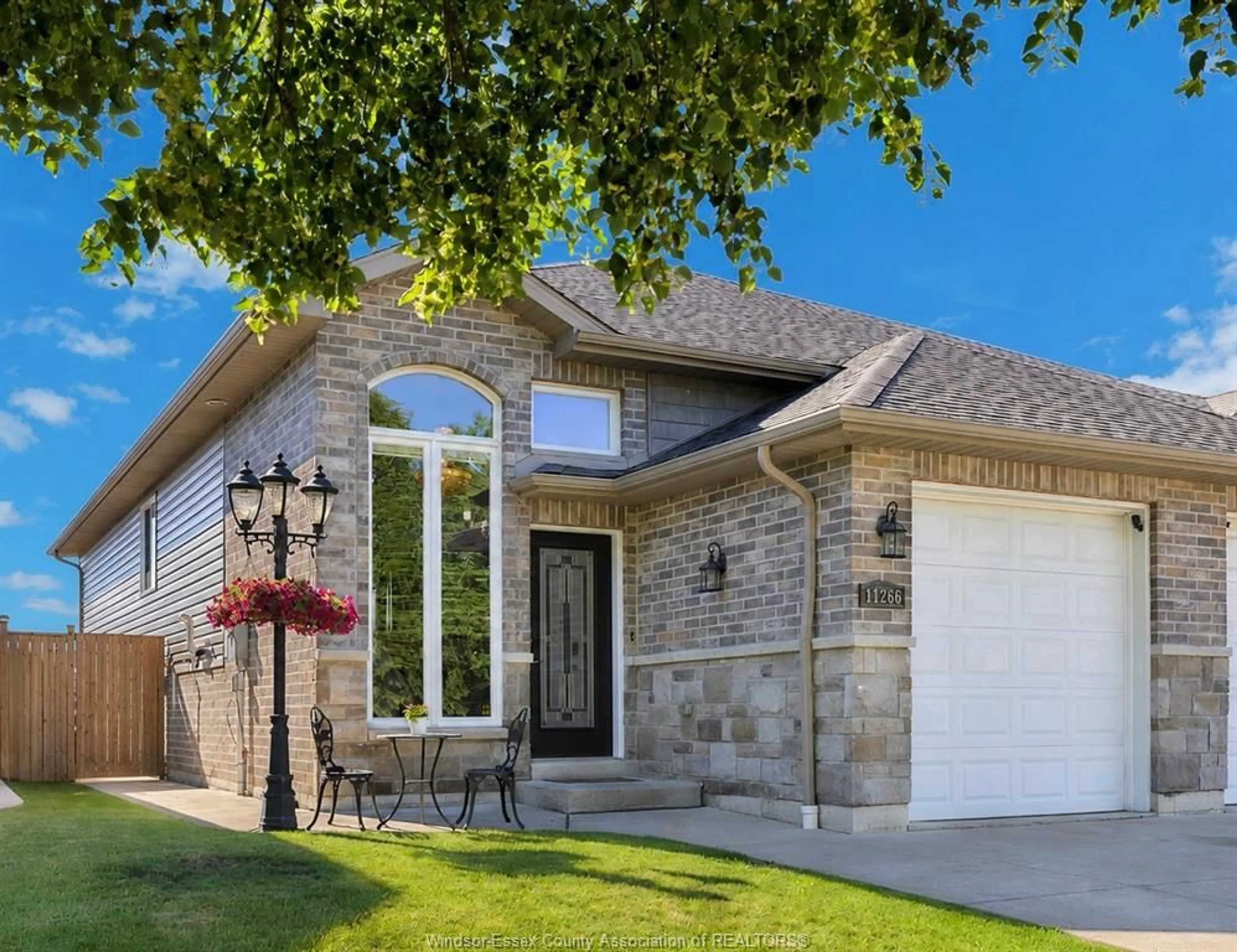 Home with brick exterior material, street for 11266 TIMBER BAY Cres, Windsor Ontario N8R 2L2