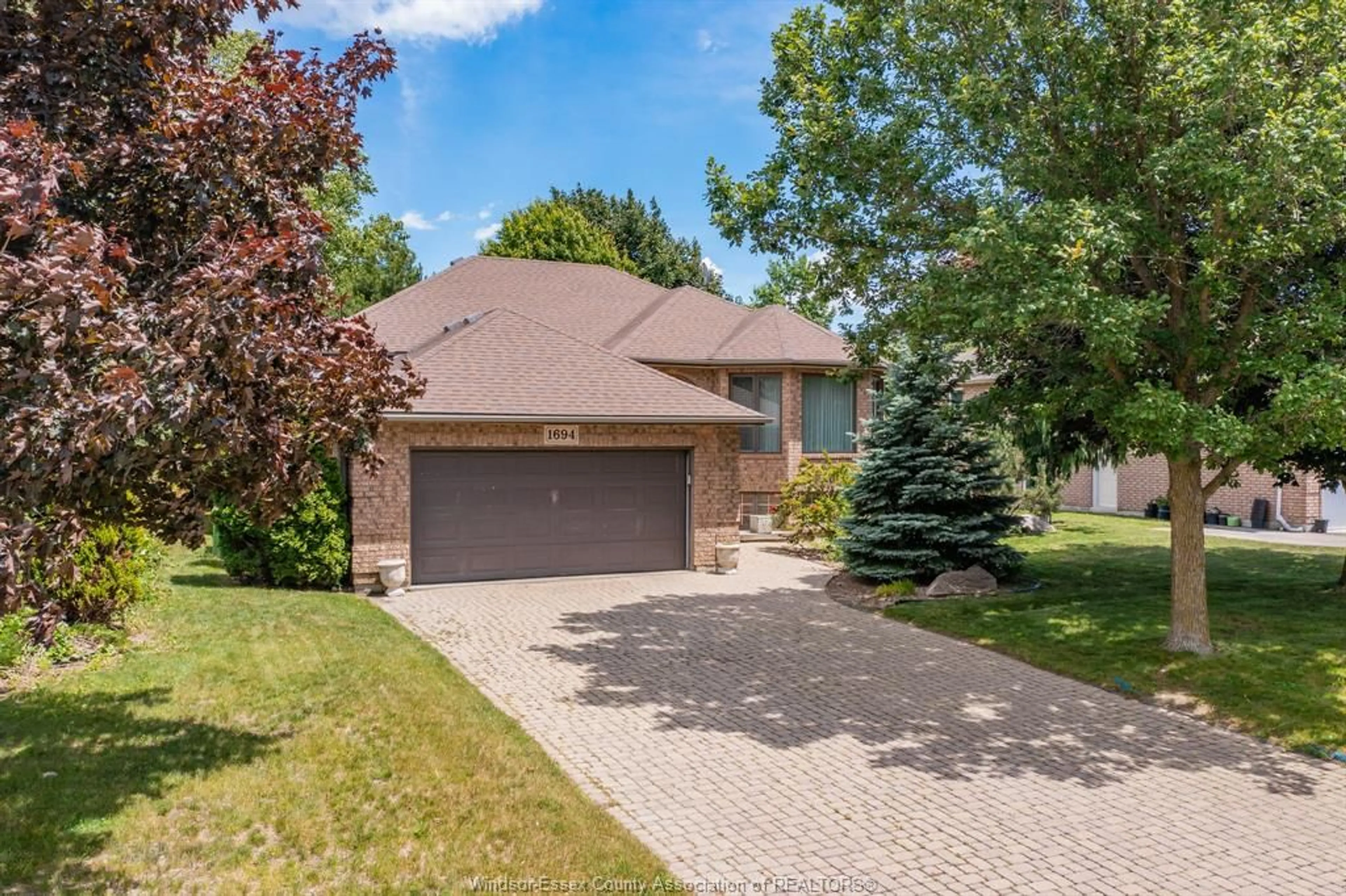 Home with brick exterior material, street for 1694 CHORNOBY, Tecumseh Ontario N8N 5A1