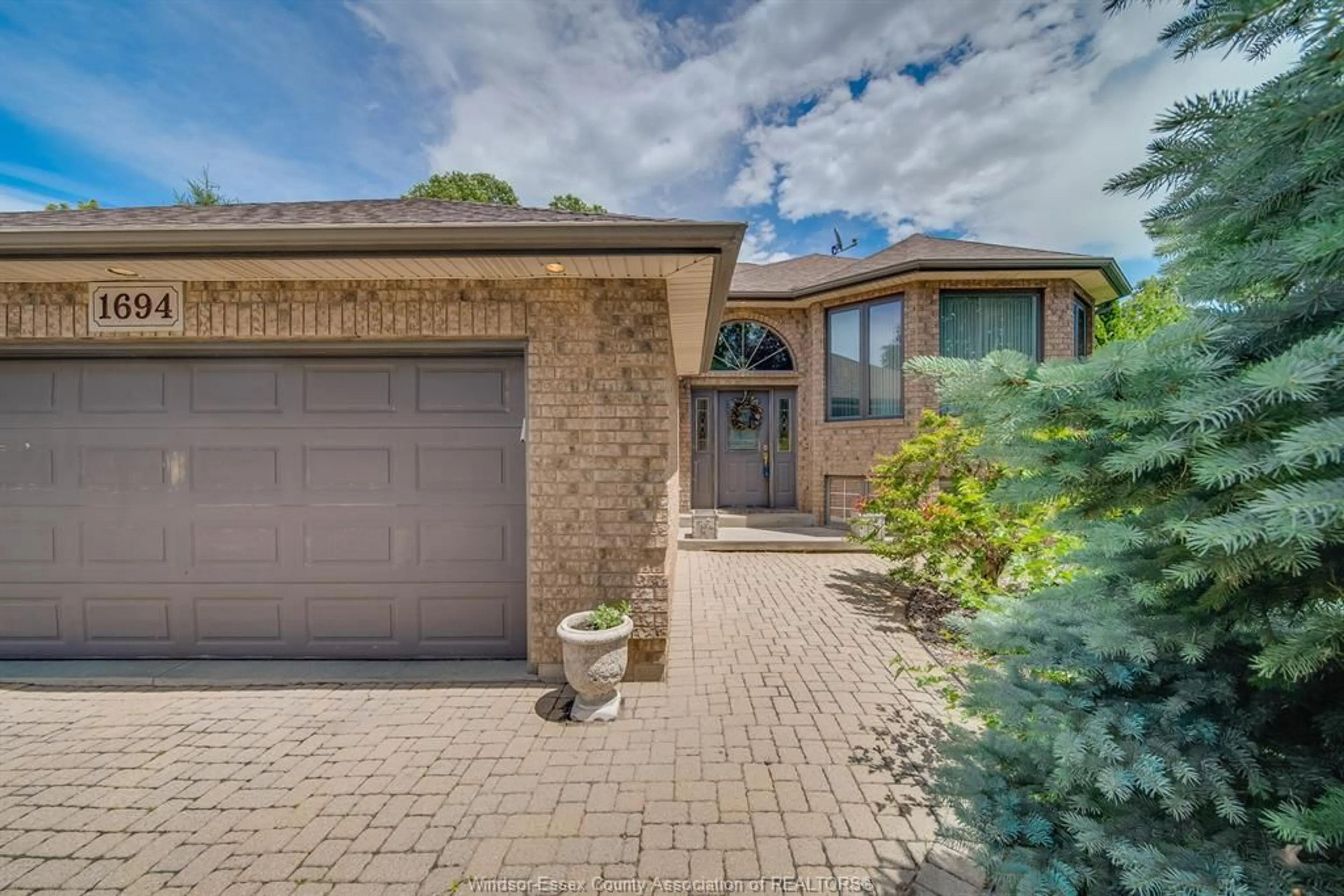 Home with brick exterior material, street for 1694 CHORNOBY, Tecumseh Ontario N8N 5A1