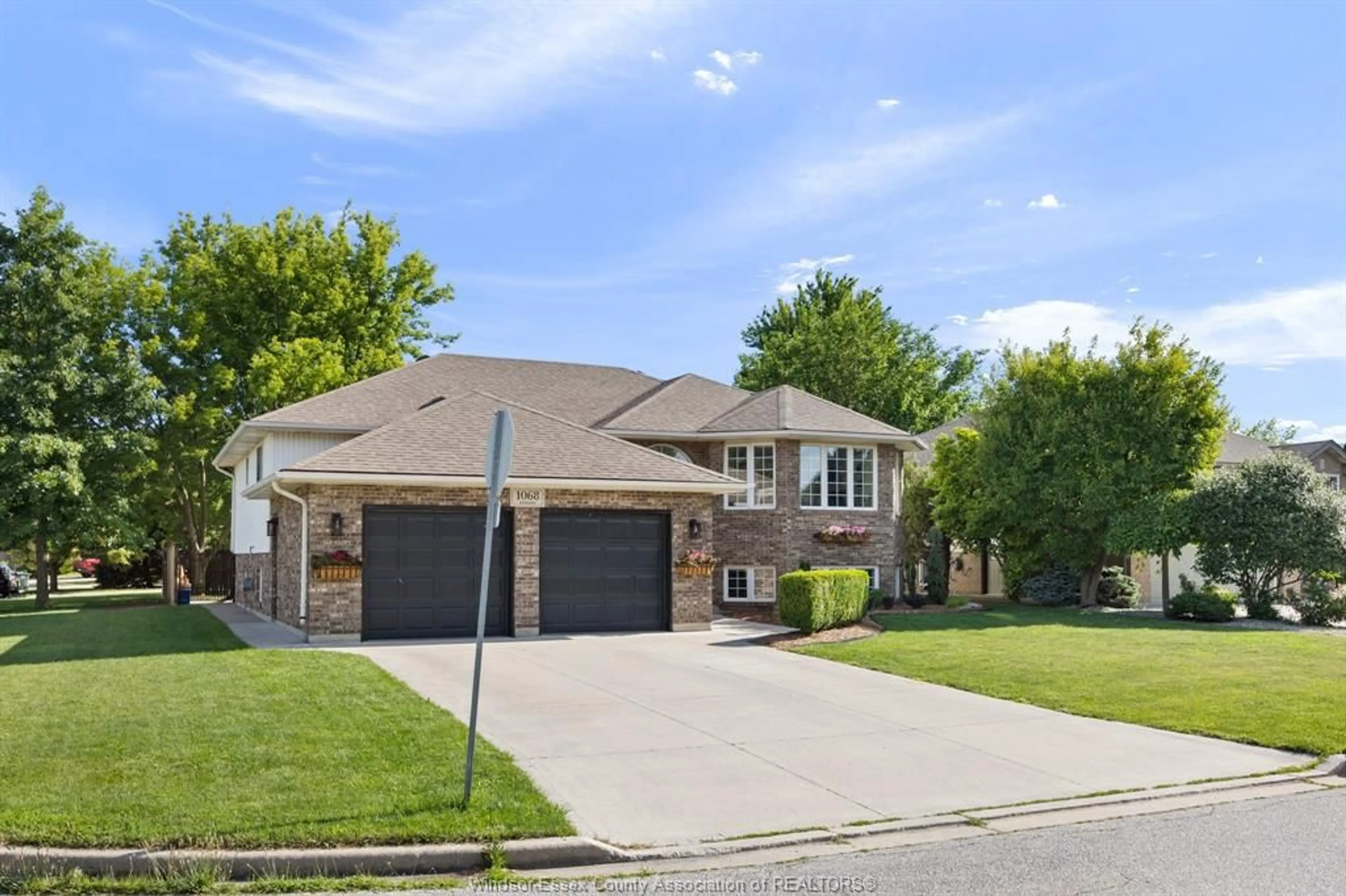 Home with brick exterior material, street for 1068 SOCRATES Cres, Windsor Ontario N9G 2N9