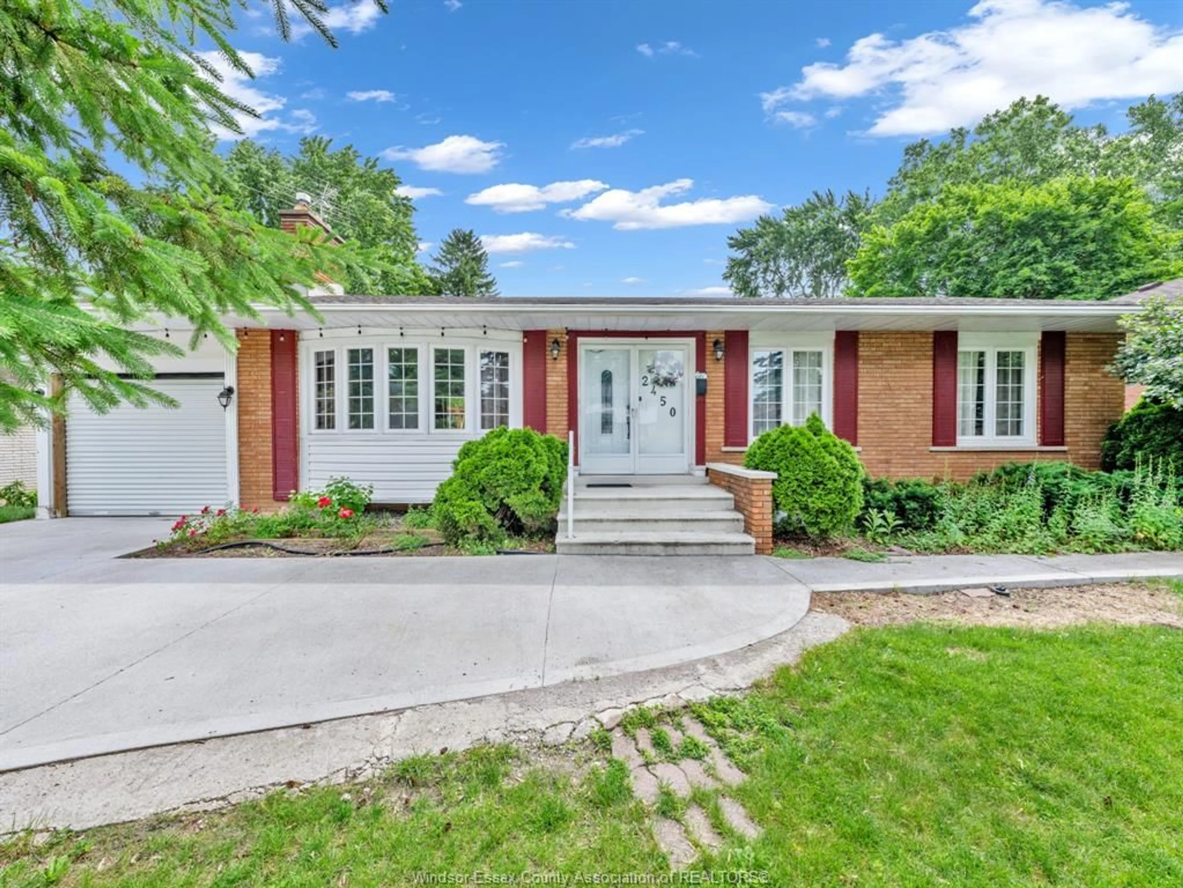 Home with brick exterior material, street for 2450 ACADEMY Dr, Windsor Ontario N9E 2G6