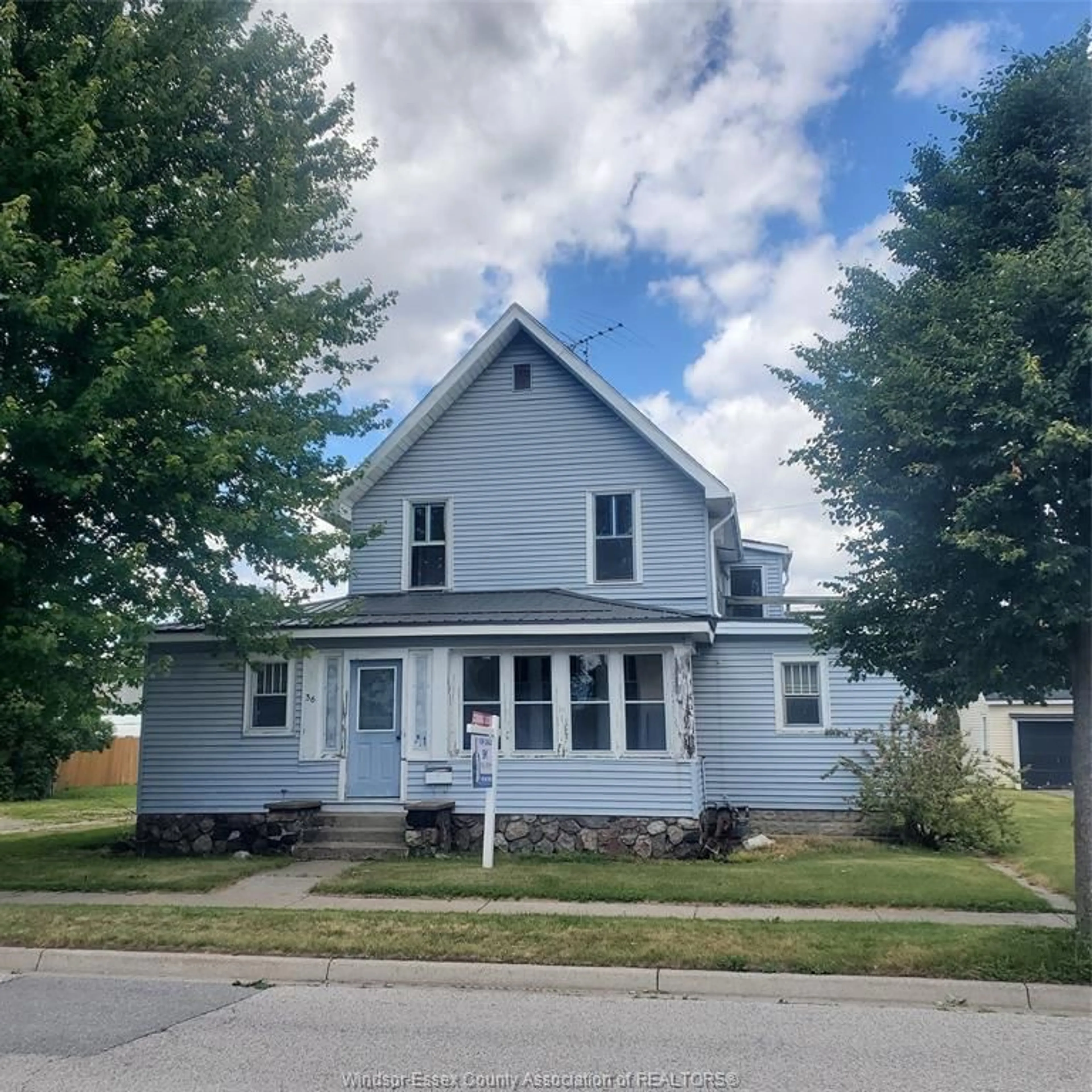 Home with vinyl exterior material, street for 36 Pearl St, Kingsville Ontario N9Y 1V3