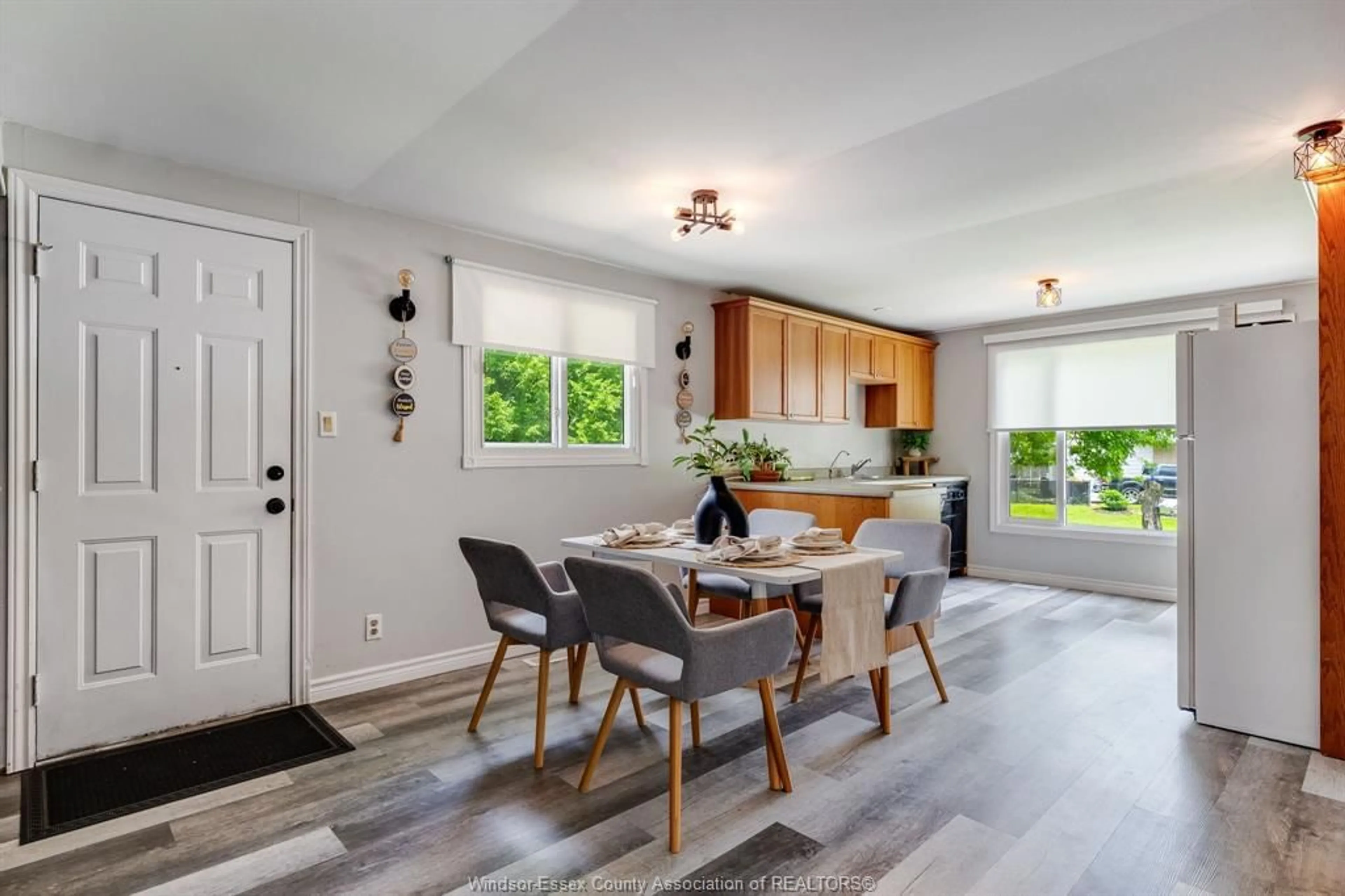 Open concept kitchen, wood/laminate floor for 302 Summerset Ave, Kingsville Ontario N9Y 2B9