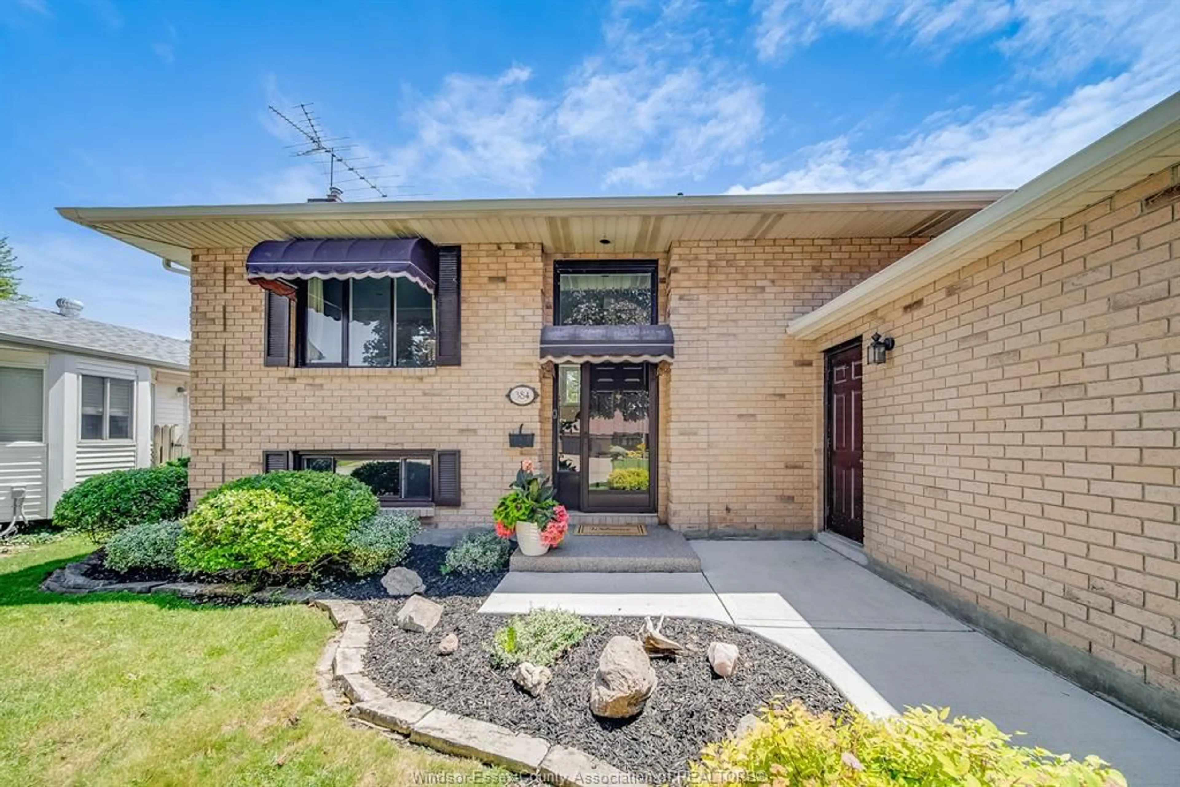 Home with brick exterior material, street for 384 AMBERLY Cres, Tecumseh Ontario N8N 3M3