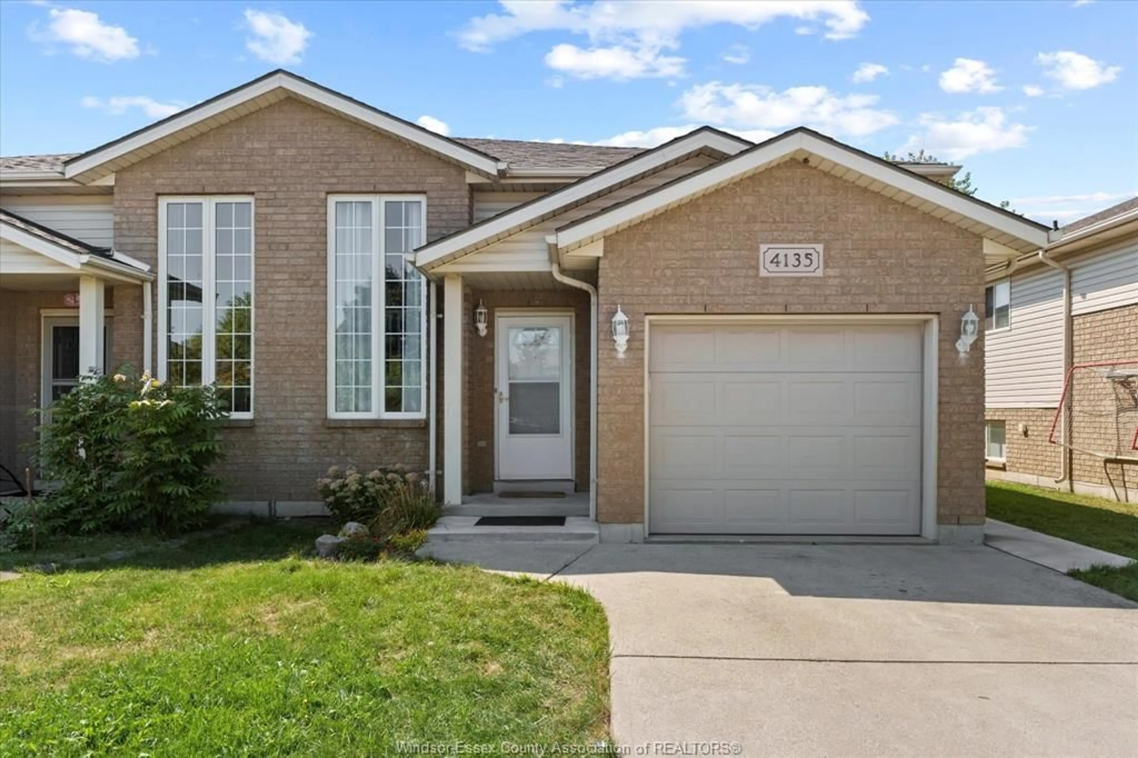 Home with brick exterior material, street for 4135 St. Clair, LaSalle Ontario N9H 2N5