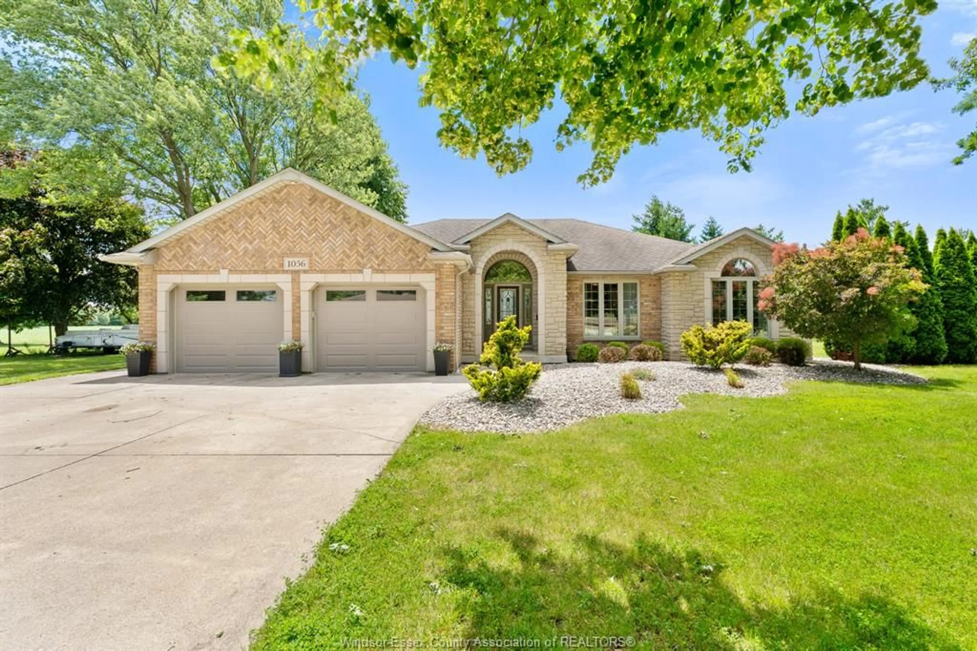 Home with brick exterior material, street for 1056 MARTIN Lane, LaSalle Ontario N9J 2X1