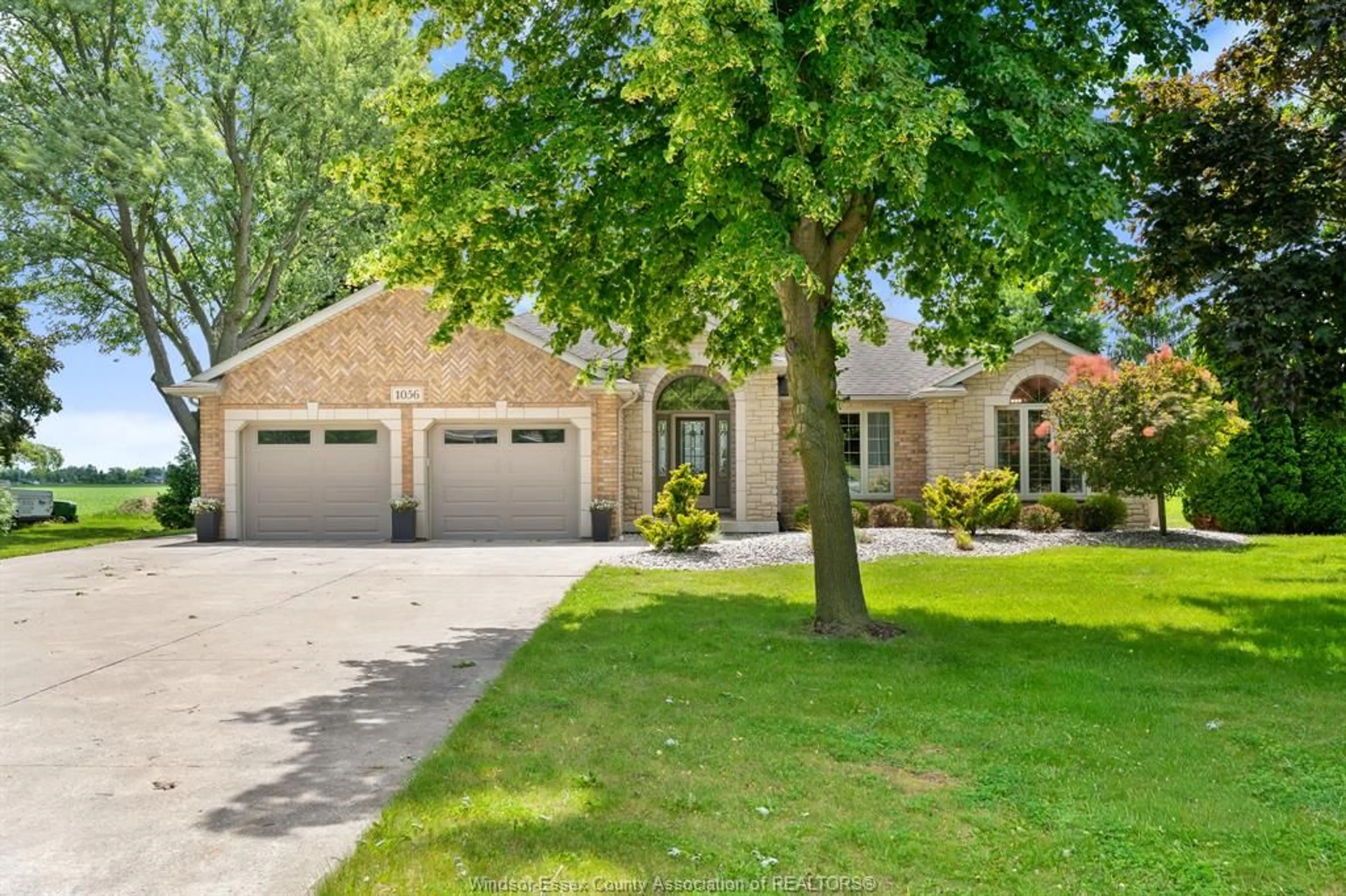 Home with brick exterior material, street for 1056 MARTIN Lane, LaSalle Ontario N9J 2X1