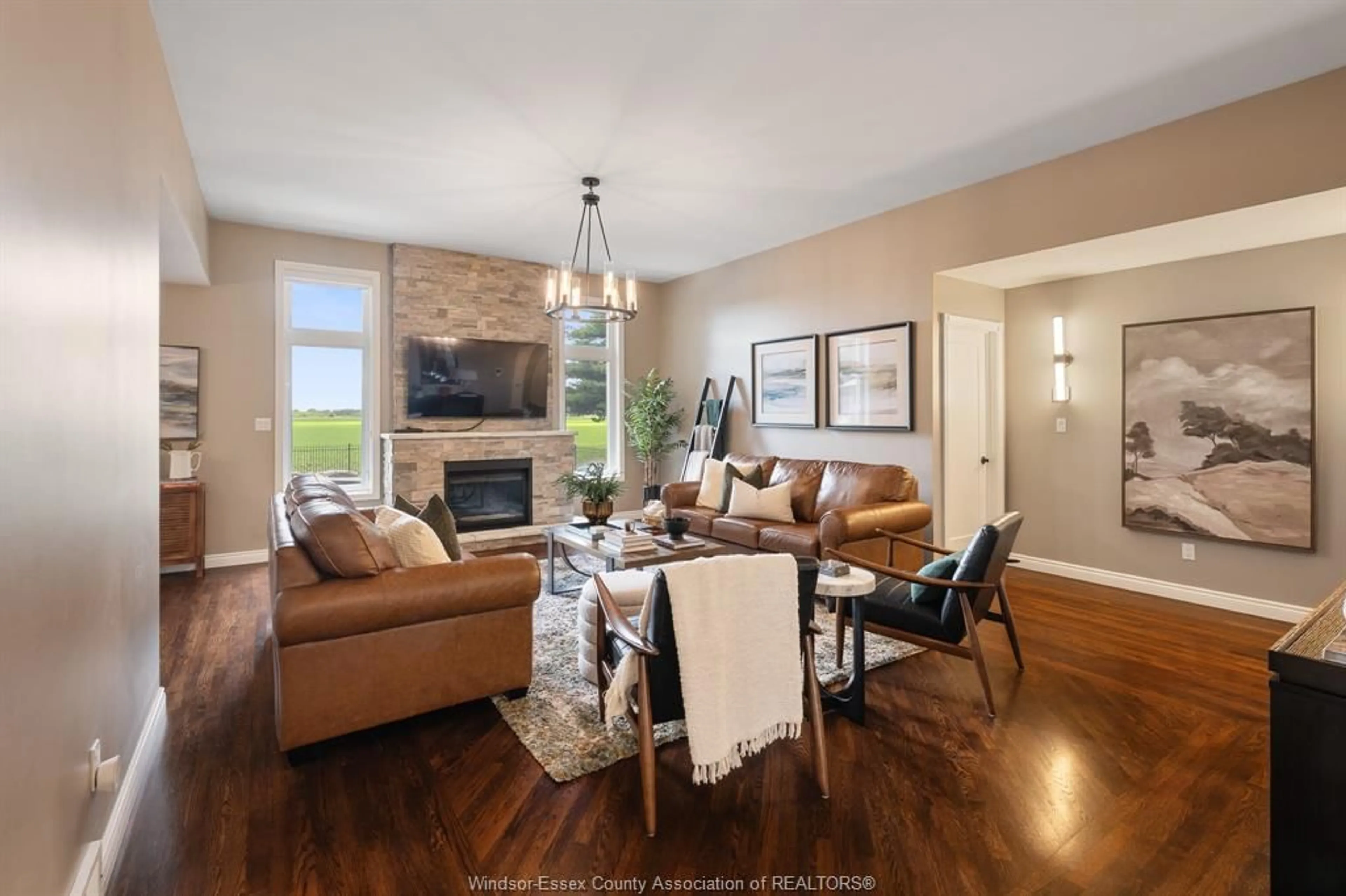 Living room with furniture, wood/laminate floor for 1056 MARTIN Lane, LaSalle Ontario N9J 2X1