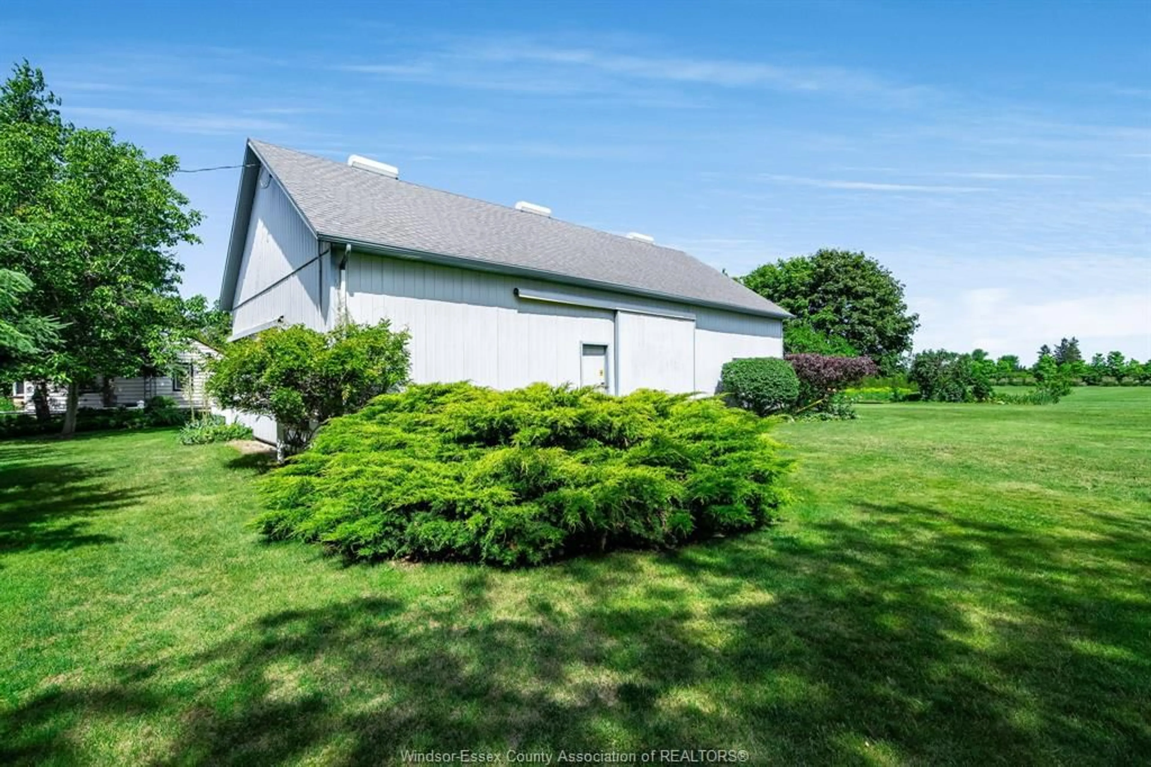 A pic from outside/outdoor area/front of a property/back of a property/a pic from drone, water/lake/river/ocean view for 1570 Road 3, Kingsville Ontario N9Y 2E5