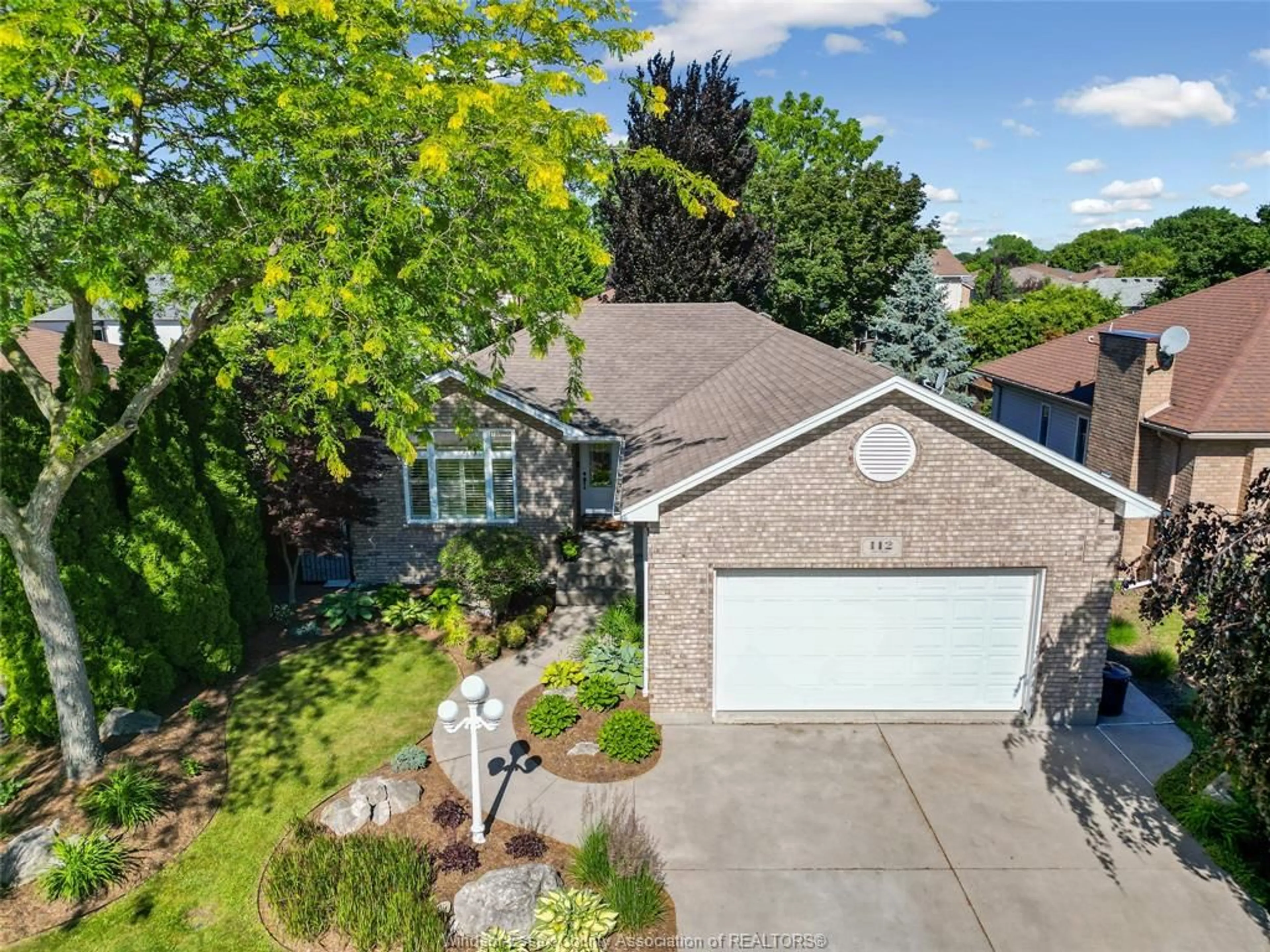 A pic from outside/outdoor area/front of a property/back of a property/a pic from drone, street for 112 FAY Crt, Lakeshore Ontario N8L 0K9