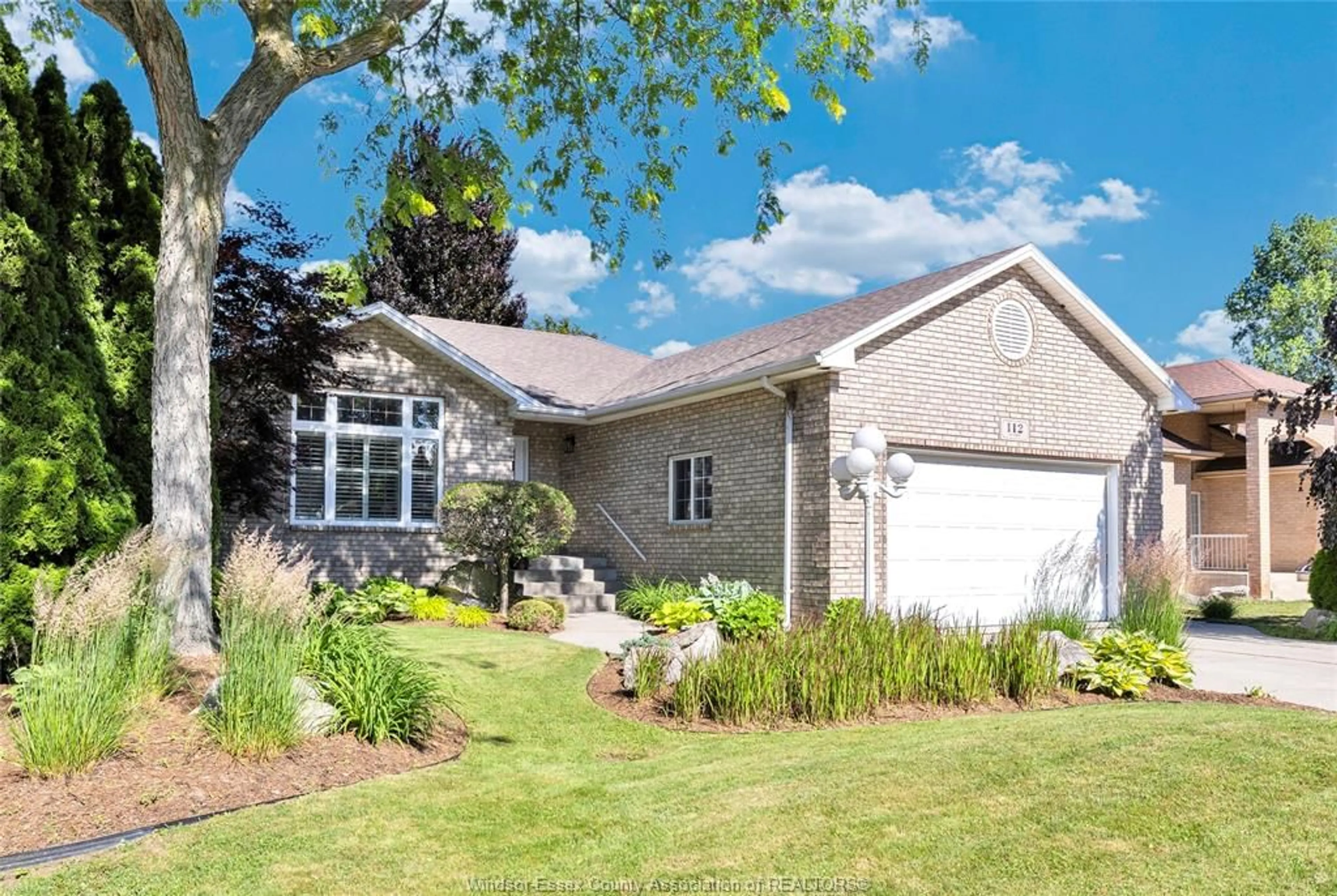 Home with brick exterior material, street for 112 FAY Crt, Lakeshore Ontario N8L 0K9
