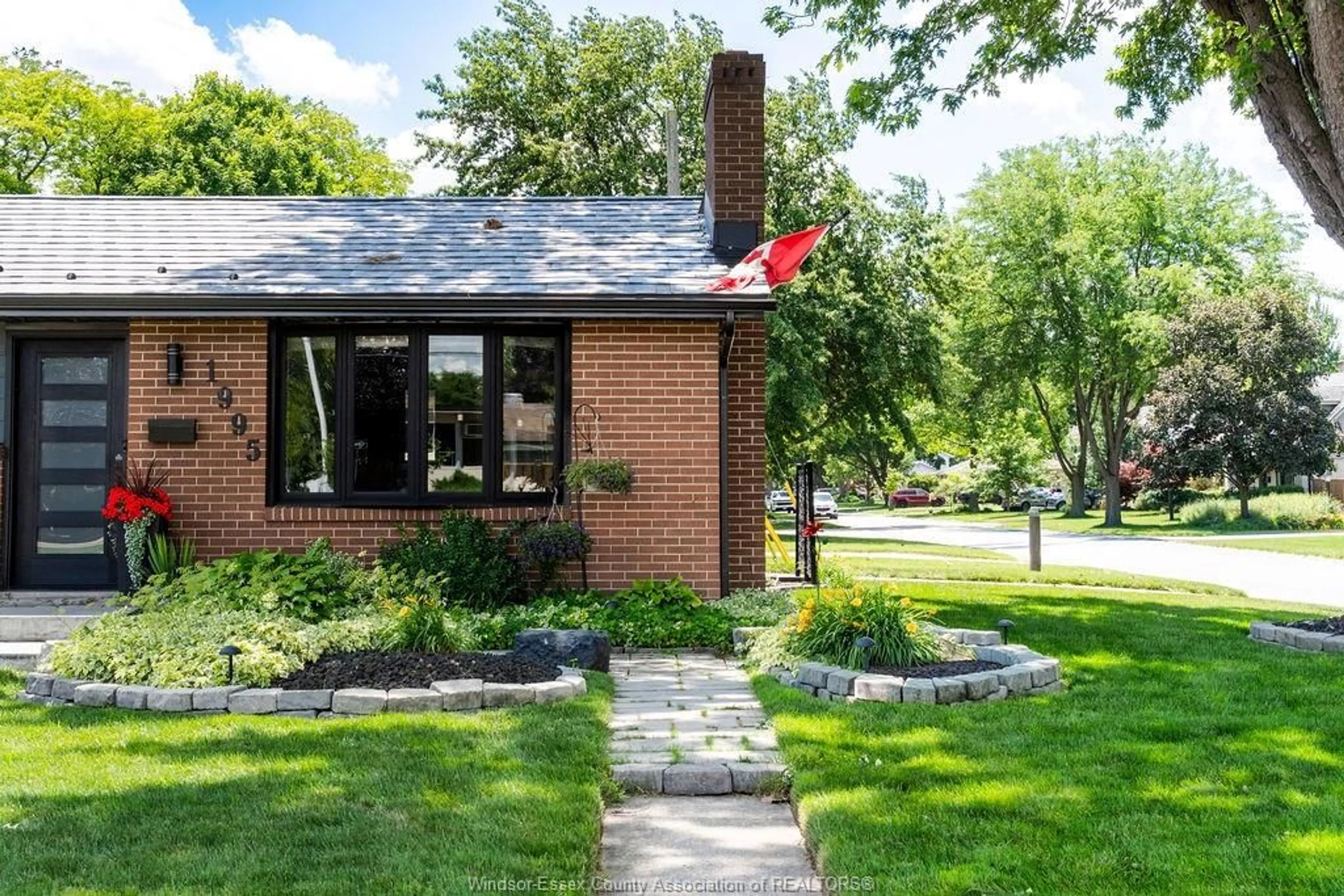 Home with brick exterior material, street for 1995 Labelle, Windsor Ontario N9E 1B5