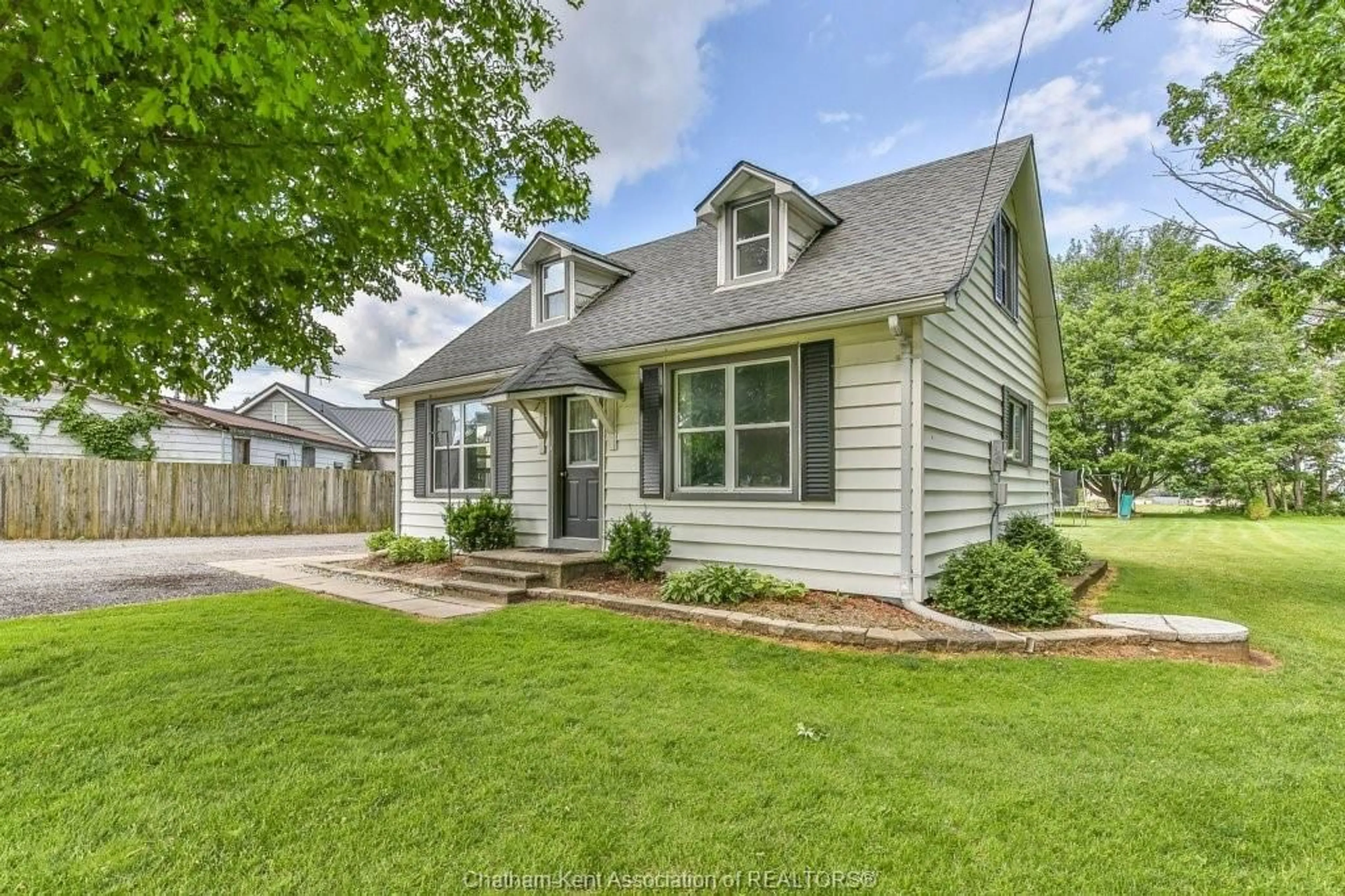 Home with vinyl exterior material, street for 6735 Richmond Rd, Elgin County Ontario N5H 2R5