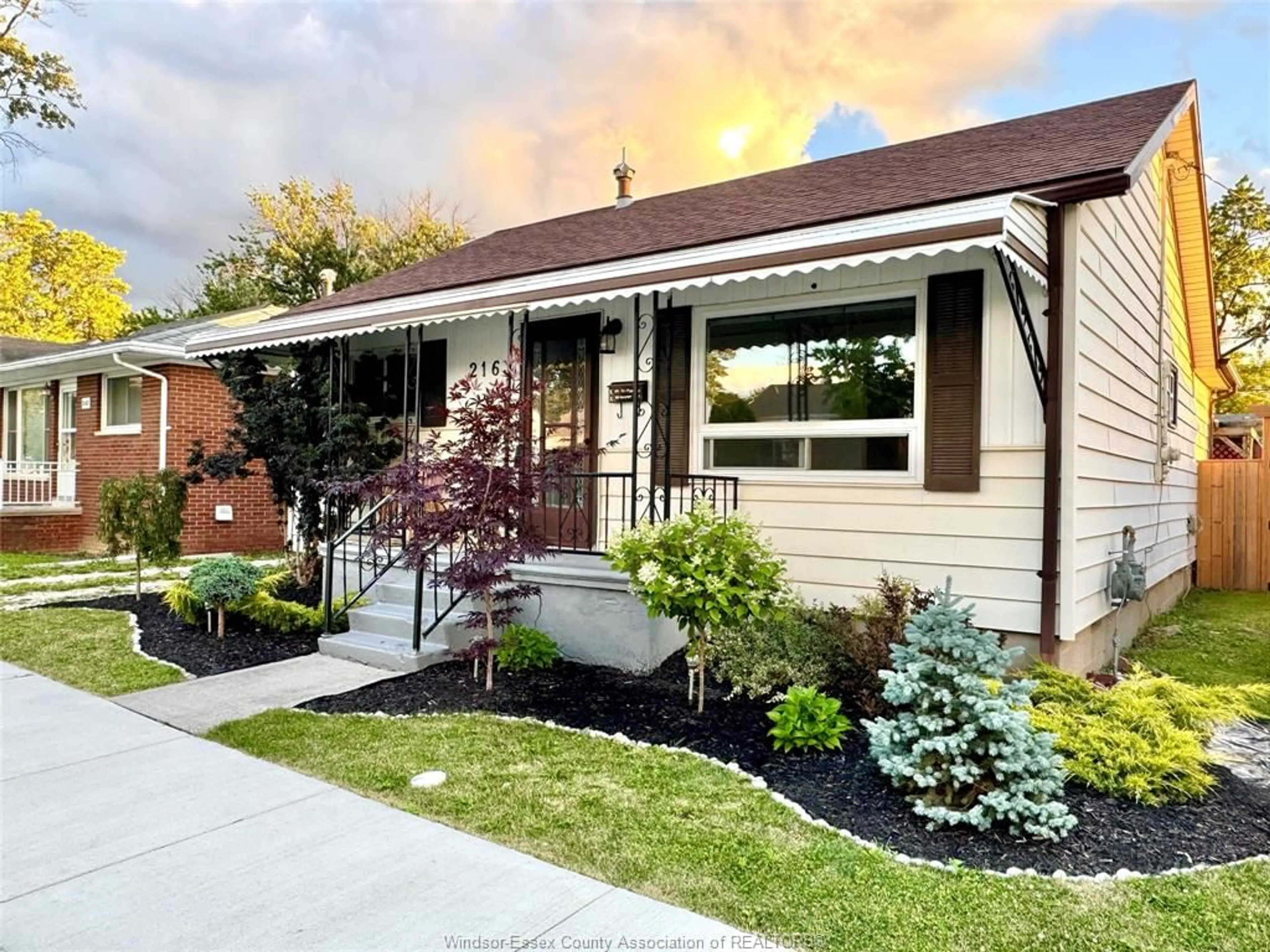 Home with vinyl exterior material, street for 2163 WELLESLEY Ave, Windsor Ontario N8W 2E8