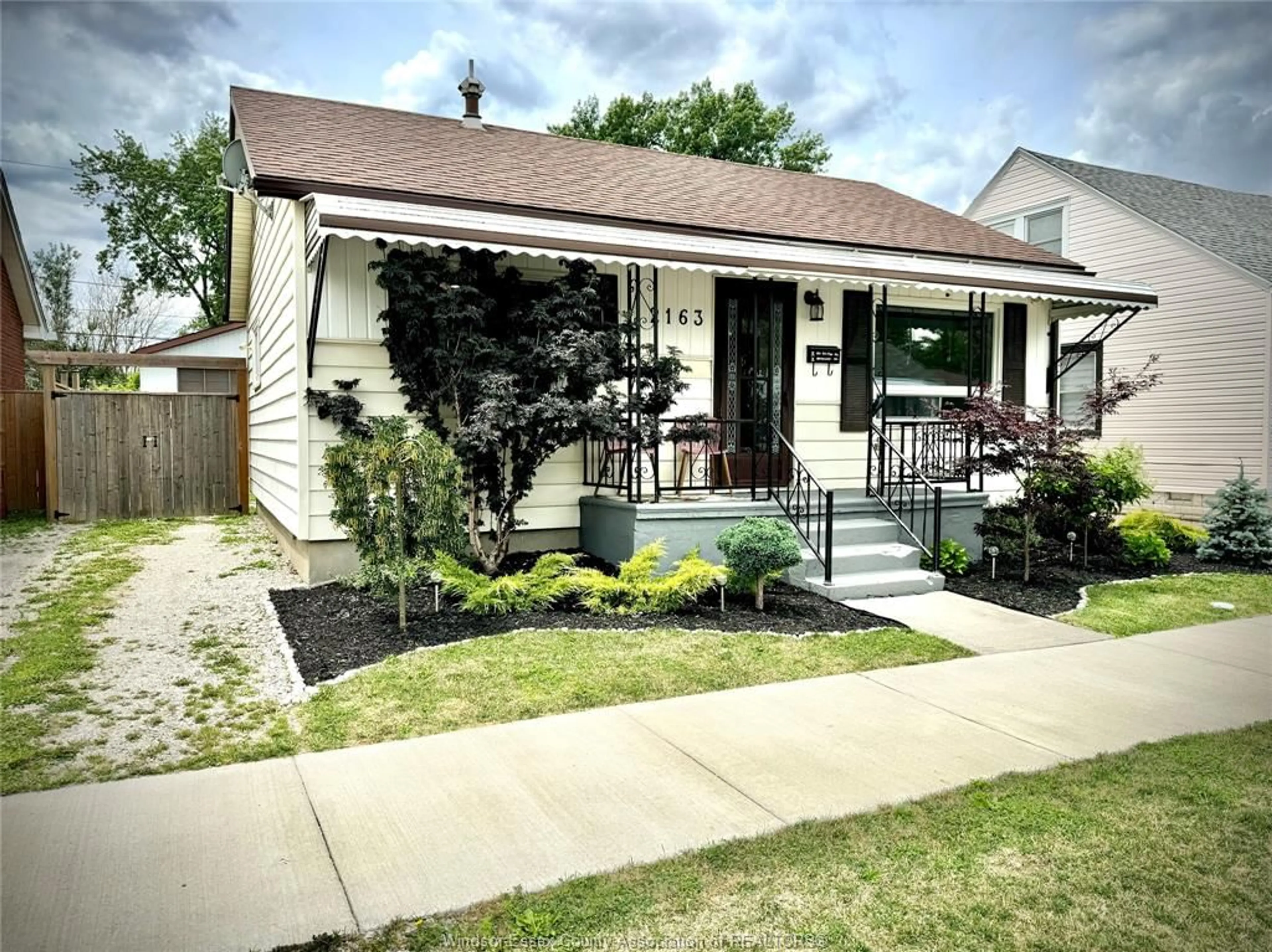Home with vinyl exterior material, street for 2163 WELLESLEY Ave, Windsor Ontario N8W 2E8