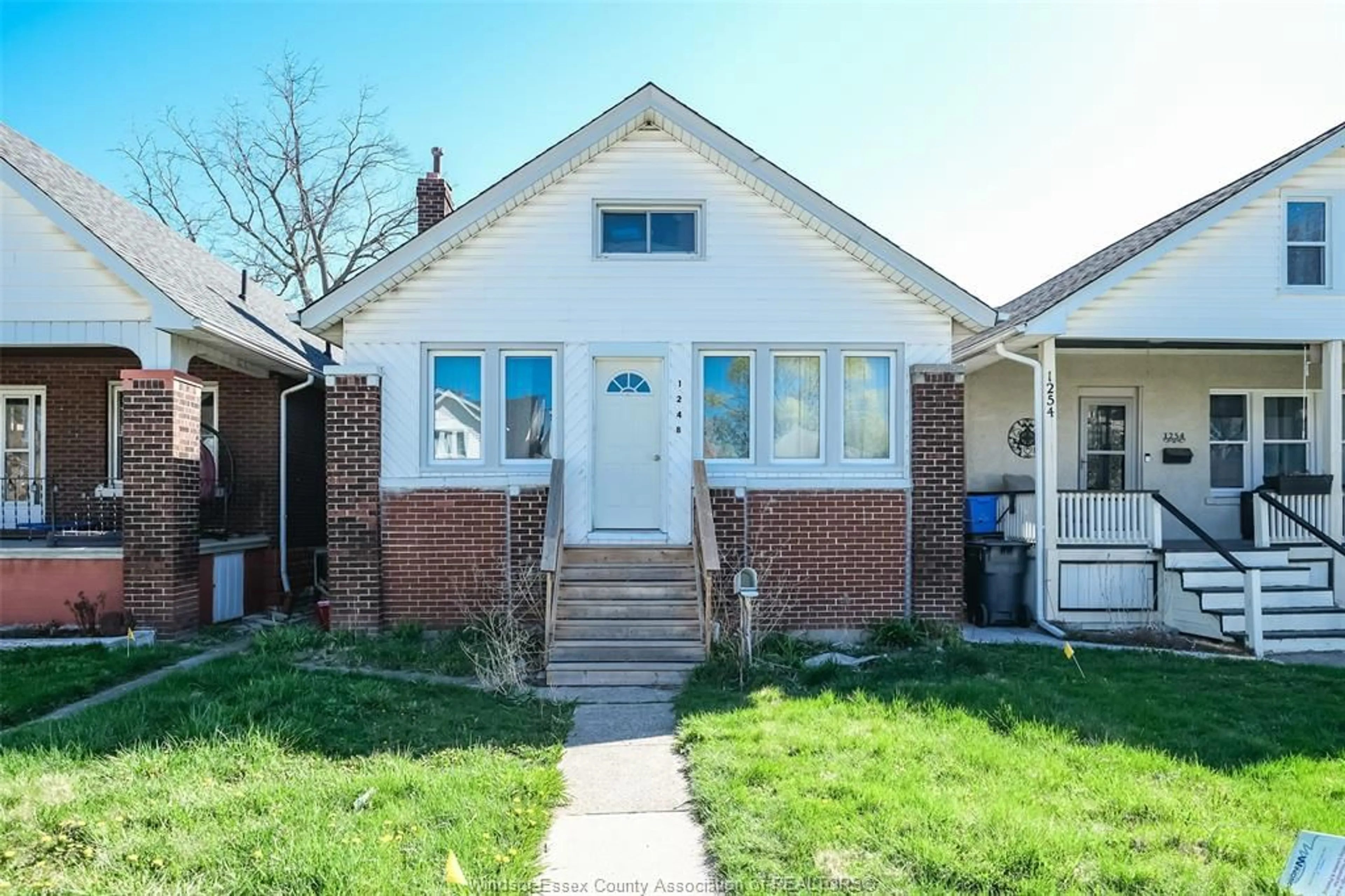 Home with brick exterior material, street for 1248 BRUCE Ave, Windsor Ontario N8X 1X3
