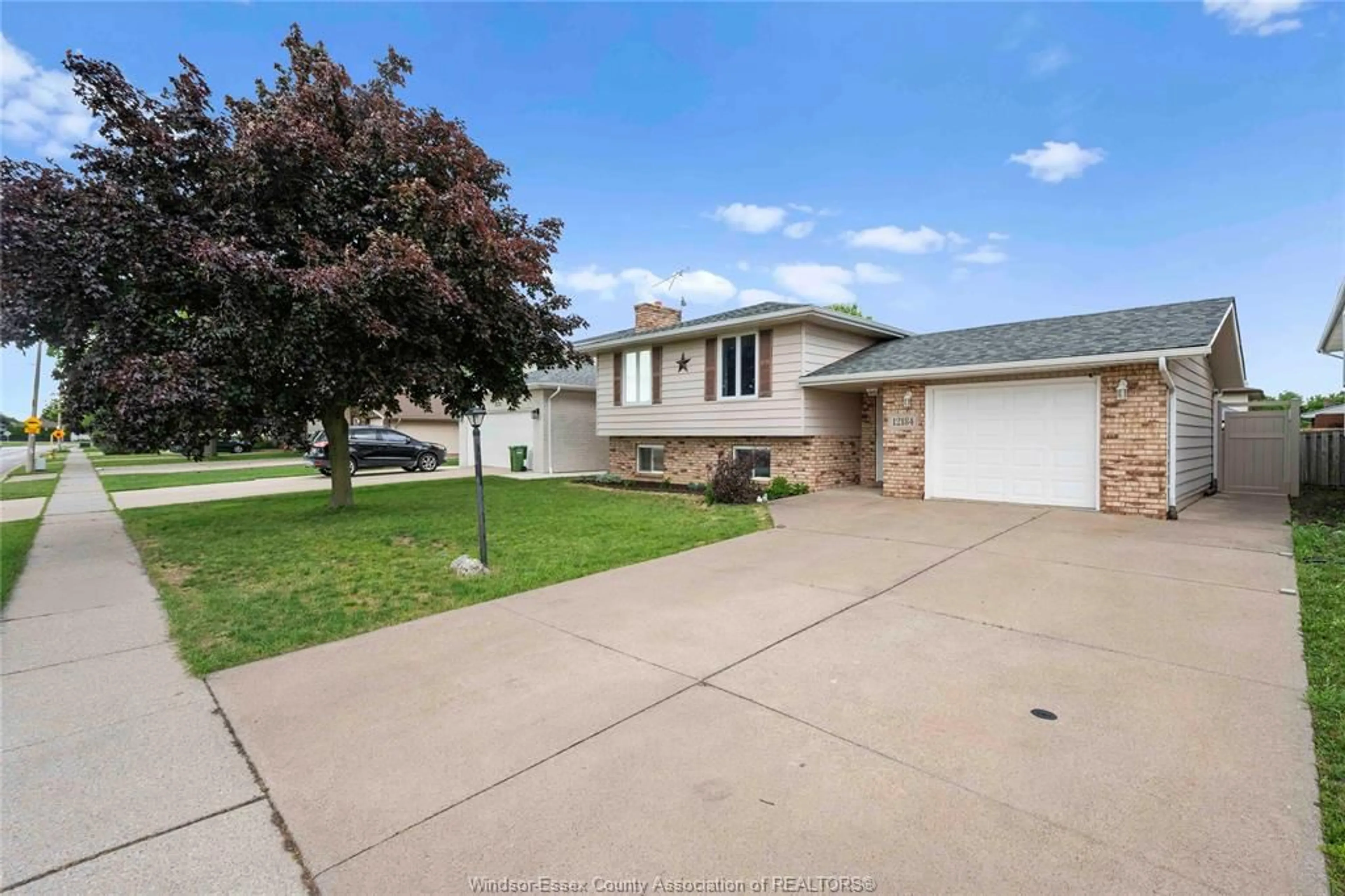 A pic from outside/outdoor area/front of a property/back of a property/a pic from drone, street for 12184 McNorton, Tecumseh Ontario N8N 3Z6