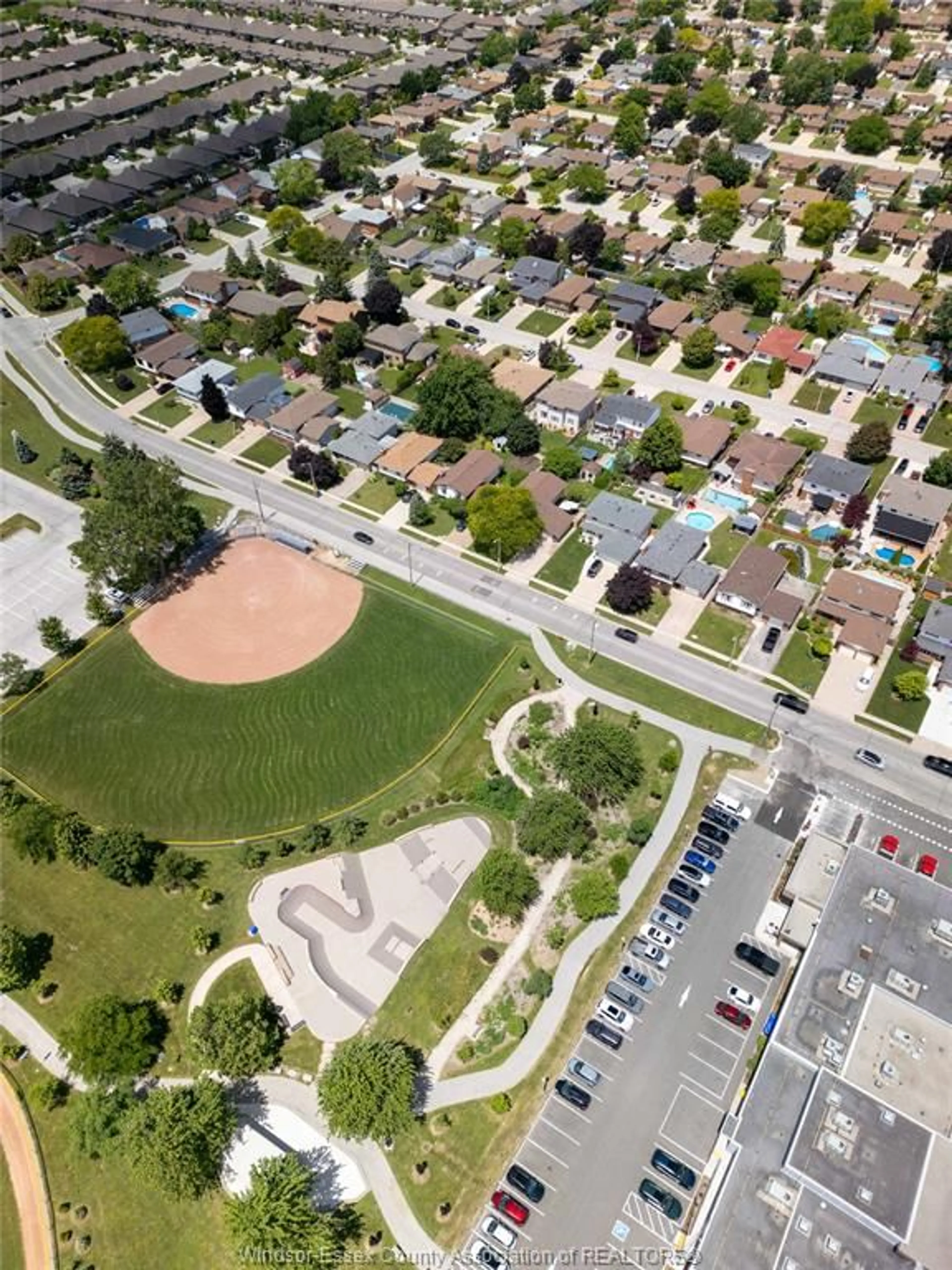 A pic from outside/outdoor area/front of a property/back of a property/a pic from drone, street for 12184 McNorton, Tecumseh Ontario N8N 3Z6