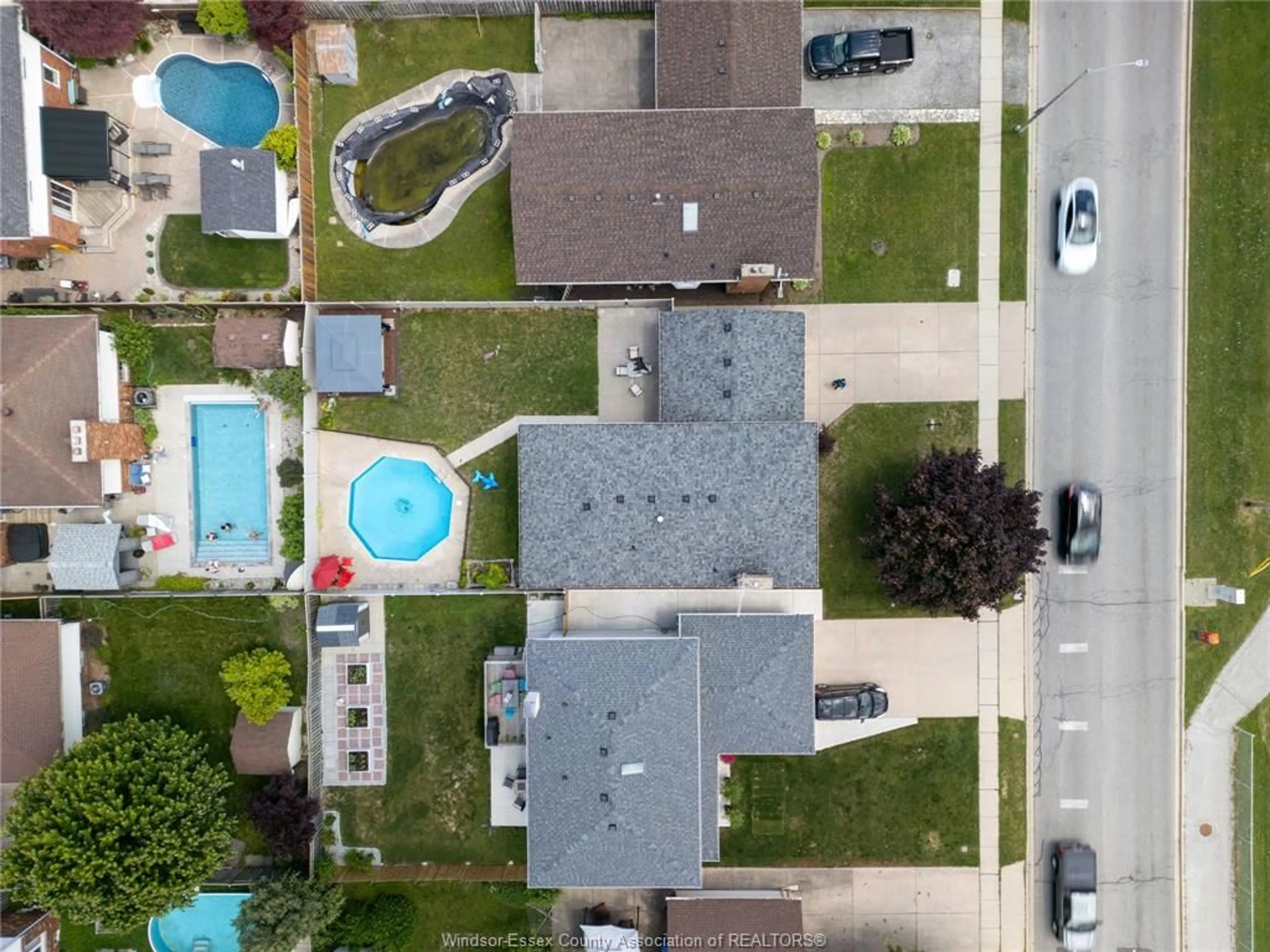 A pic from outside/outdoor area/front of a property/back of a property/a pic from drone, street for 12184 McNorton, Tecumseh Ontario N8N 3Z6