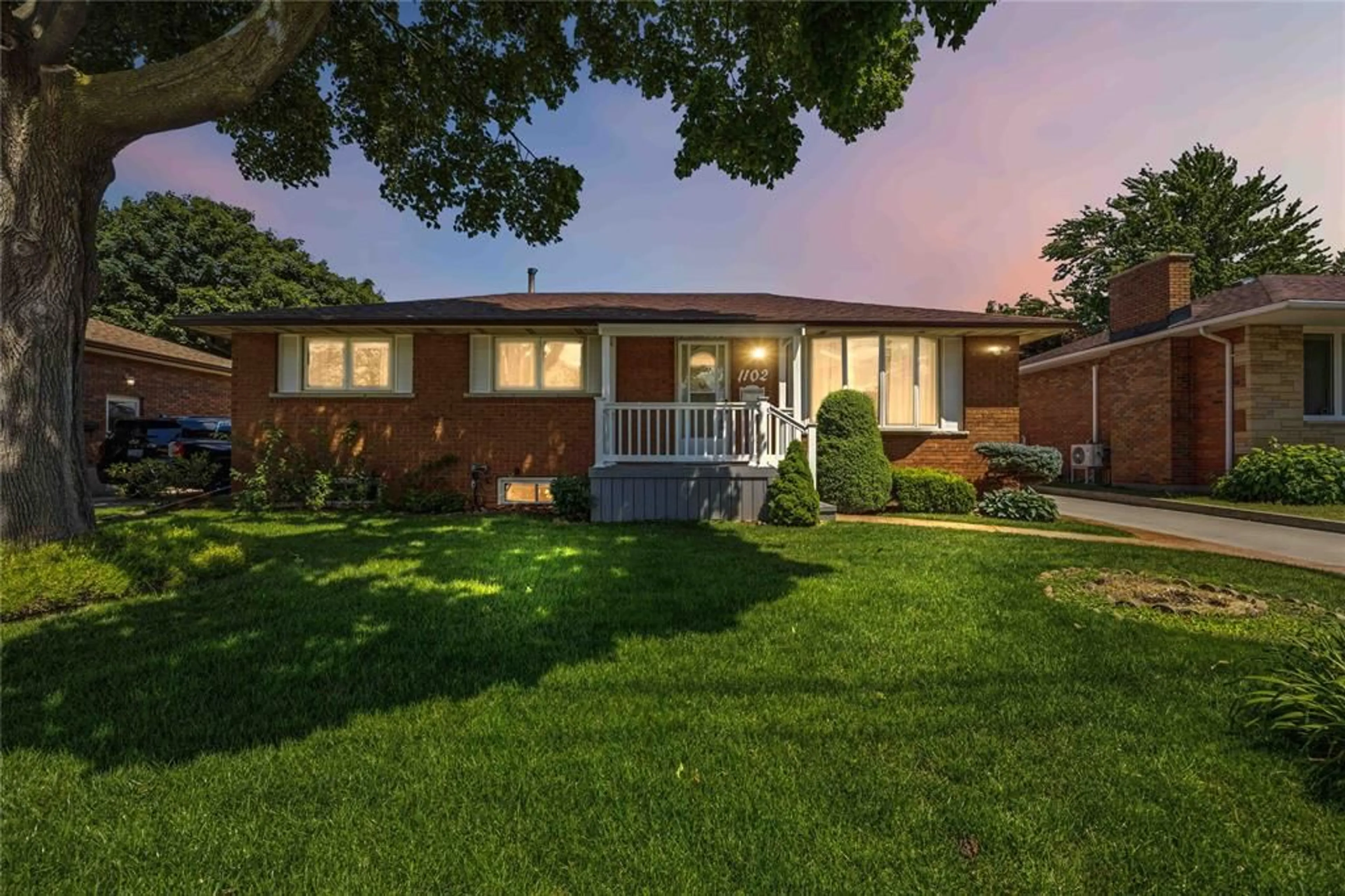 Home with brick exterior material, street for 1102 Indian Rd, Sarnia Ontario N7V 4C5