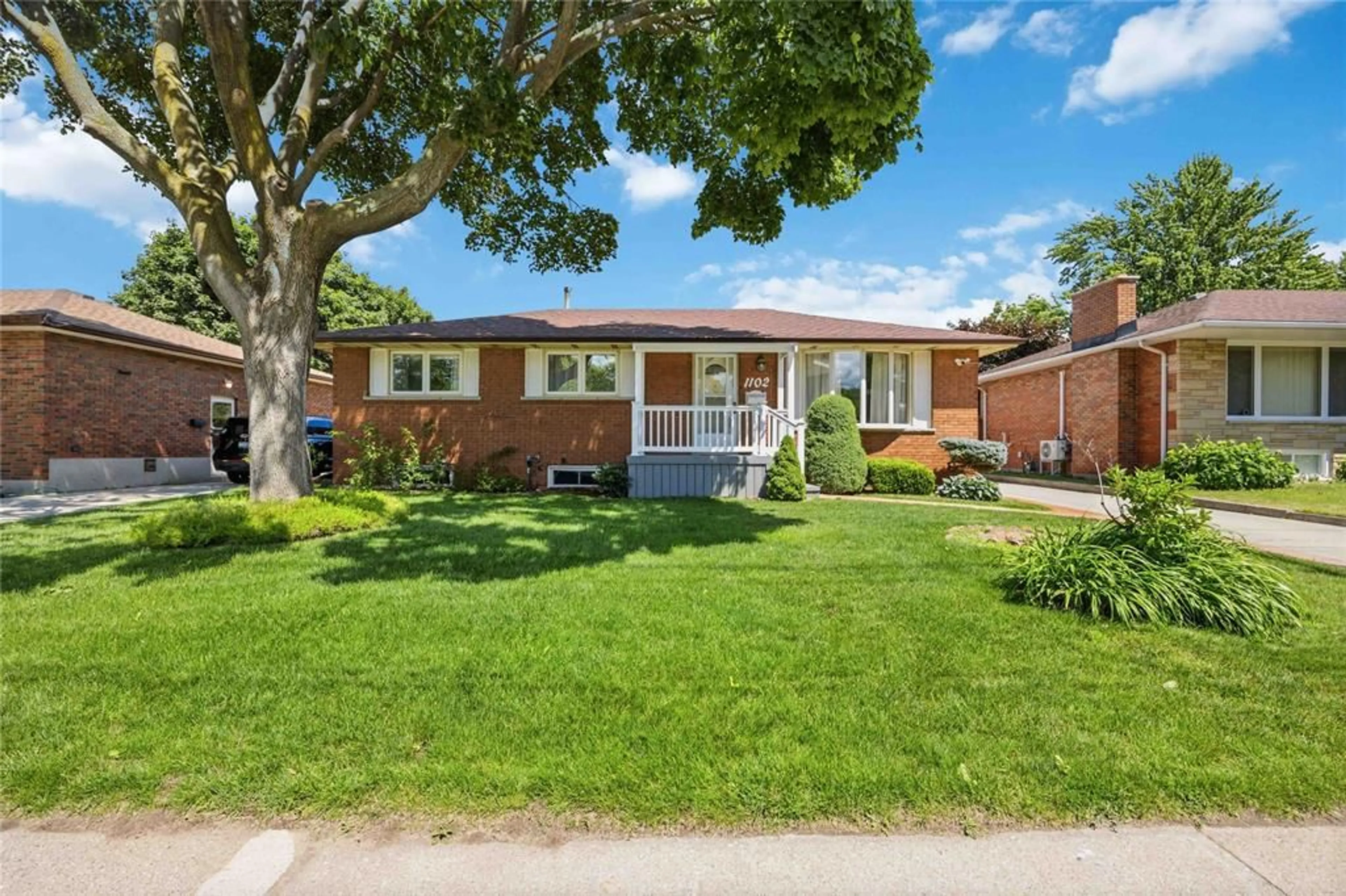 Home with brick exterior material, street for 1102 Indian Rd, Sarnia Ontario N7V 4C5