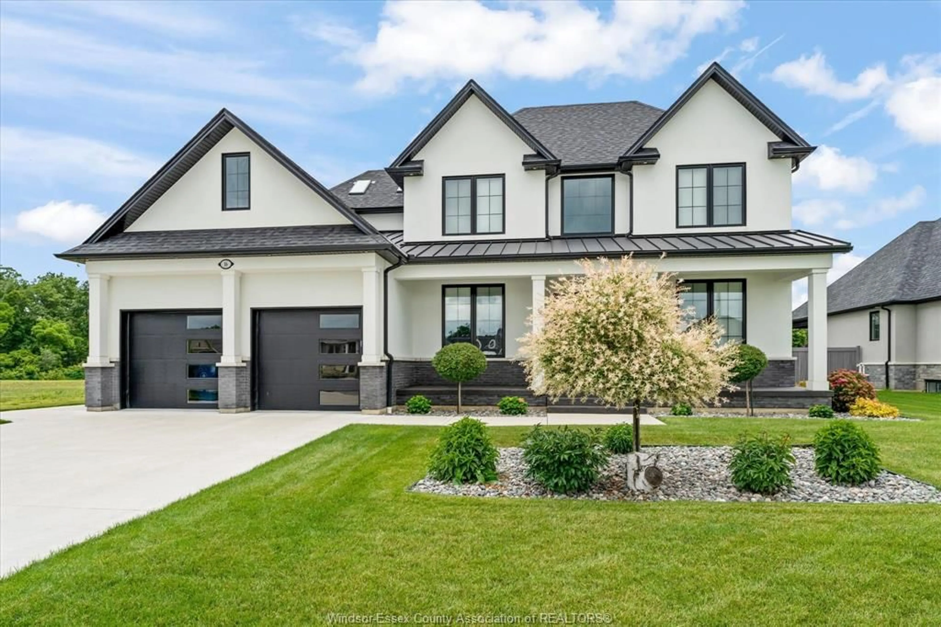 Home with brick exterior material, street for 16 YORK Blvd, Kingsville Ontario N9Y 0E5
