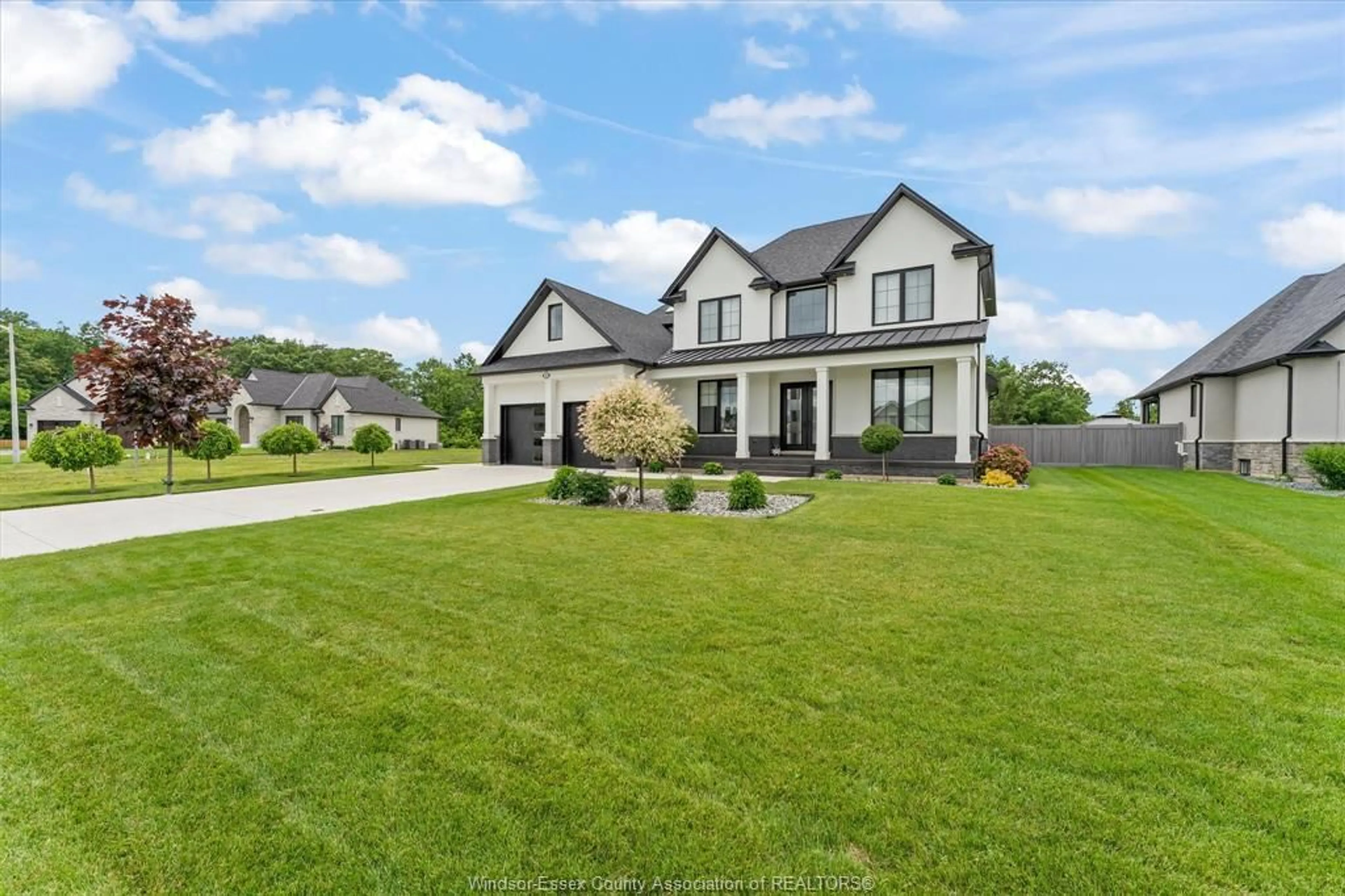 Home with brick exterior material, street for 16 YORK Blvd, Kingsville Ontario N9Y 0E5