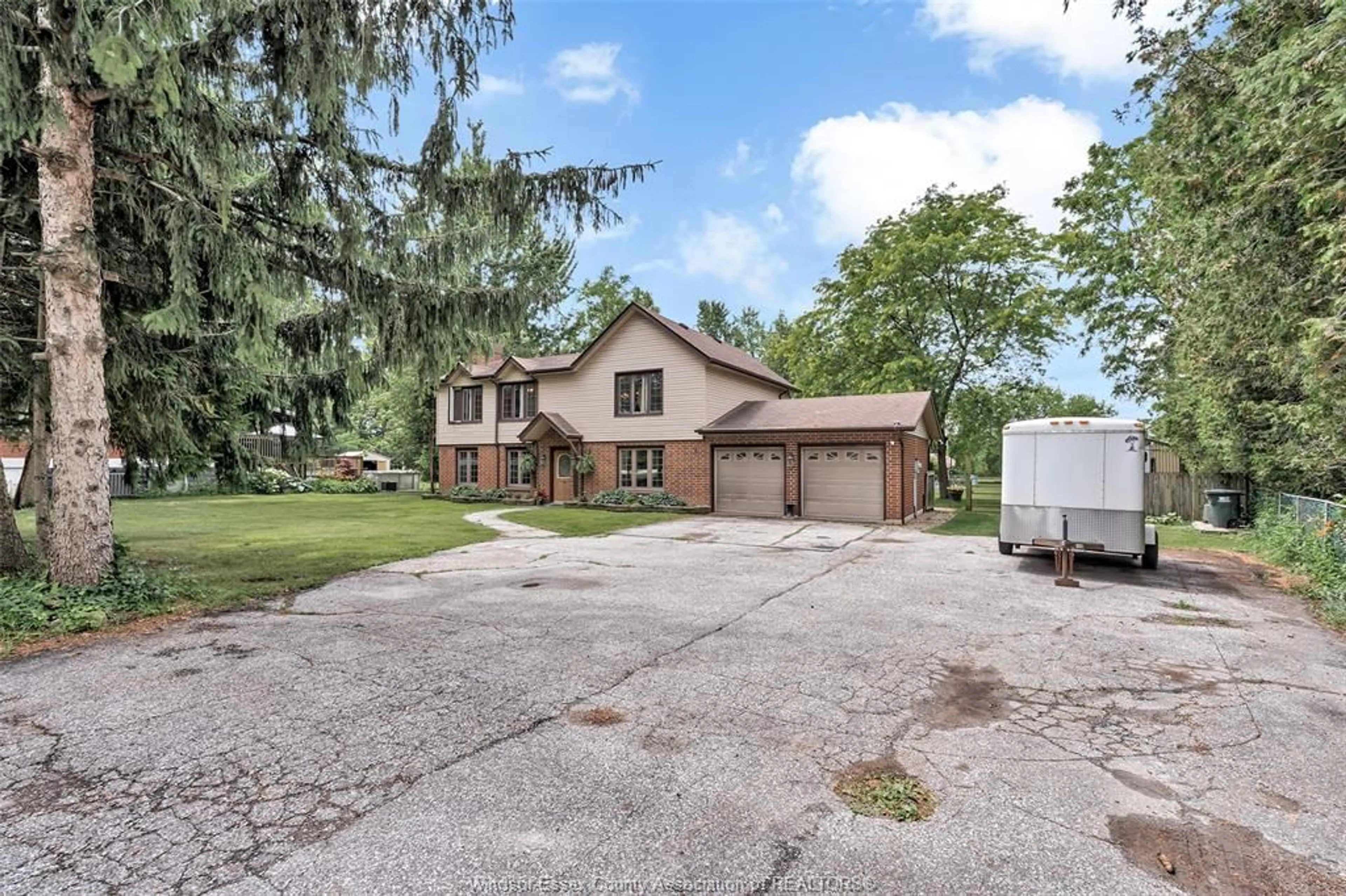 A pic from outside/outdoor area/front of a property/back of a property/a pic from drone, street for 425 COUNTY RD 34, Kingsville Ontario N8M 2X5