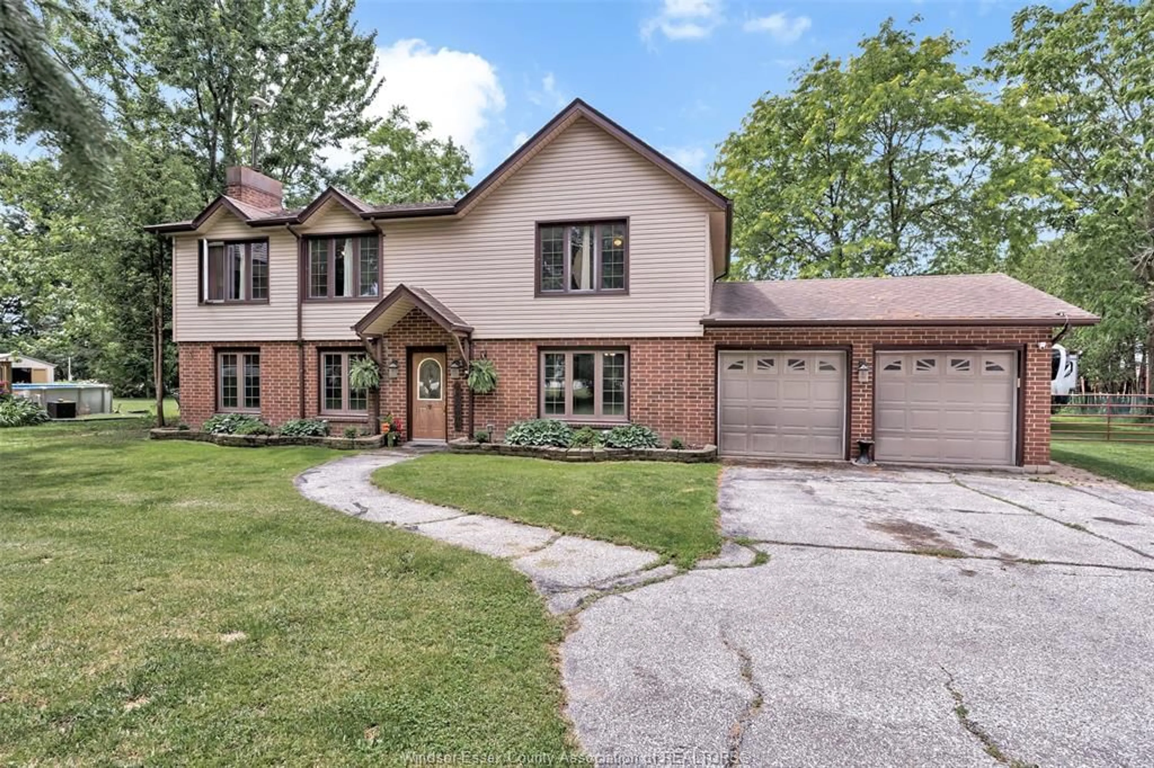Home with brick exterior material, street for 425 COUNTY RD 34, Kingsville Ontario N8M 2X5