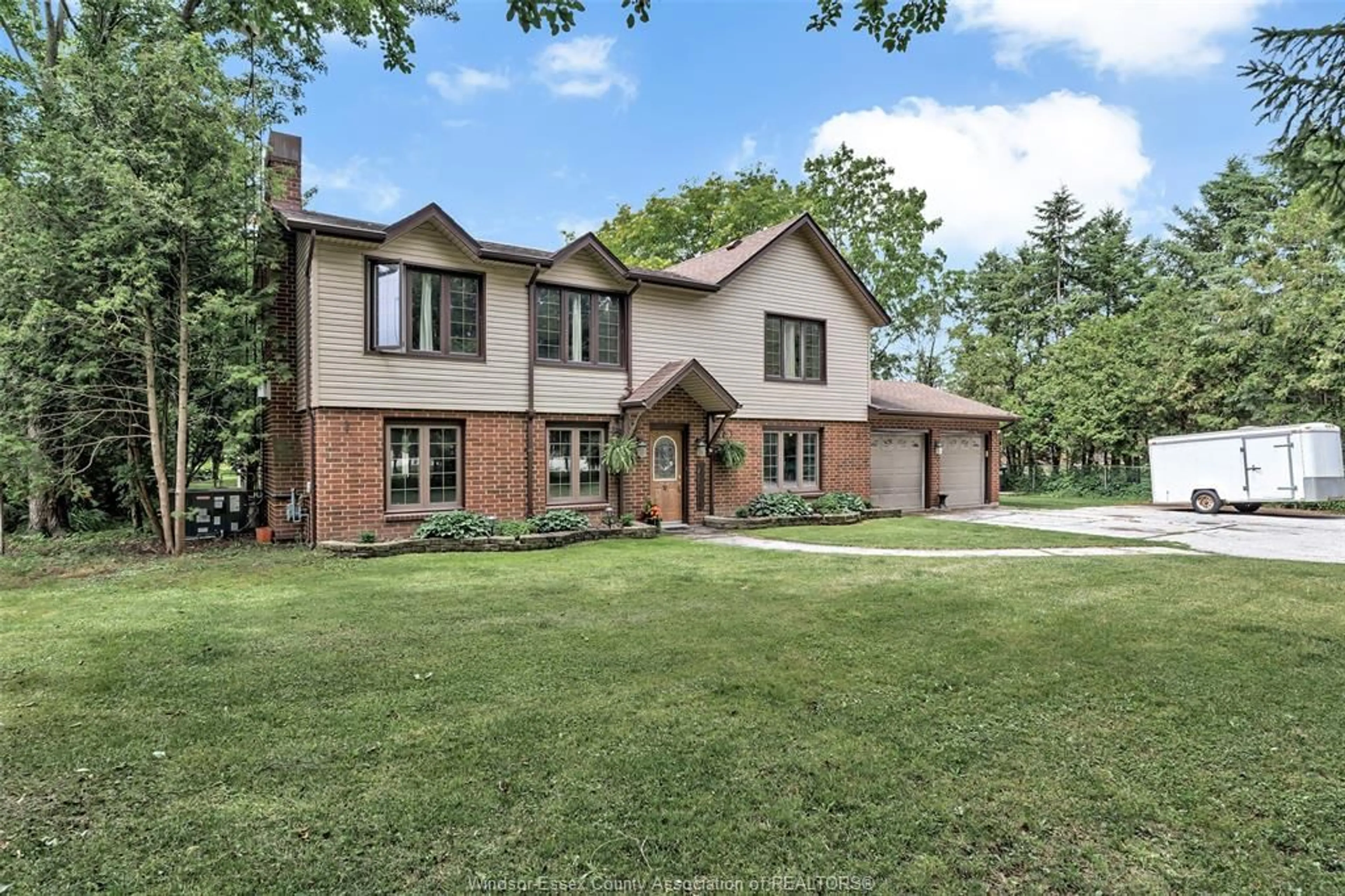 Home with brick exterior material, street for 425 COUNTY RD 34, Kingsville Ontario N8M 2X5