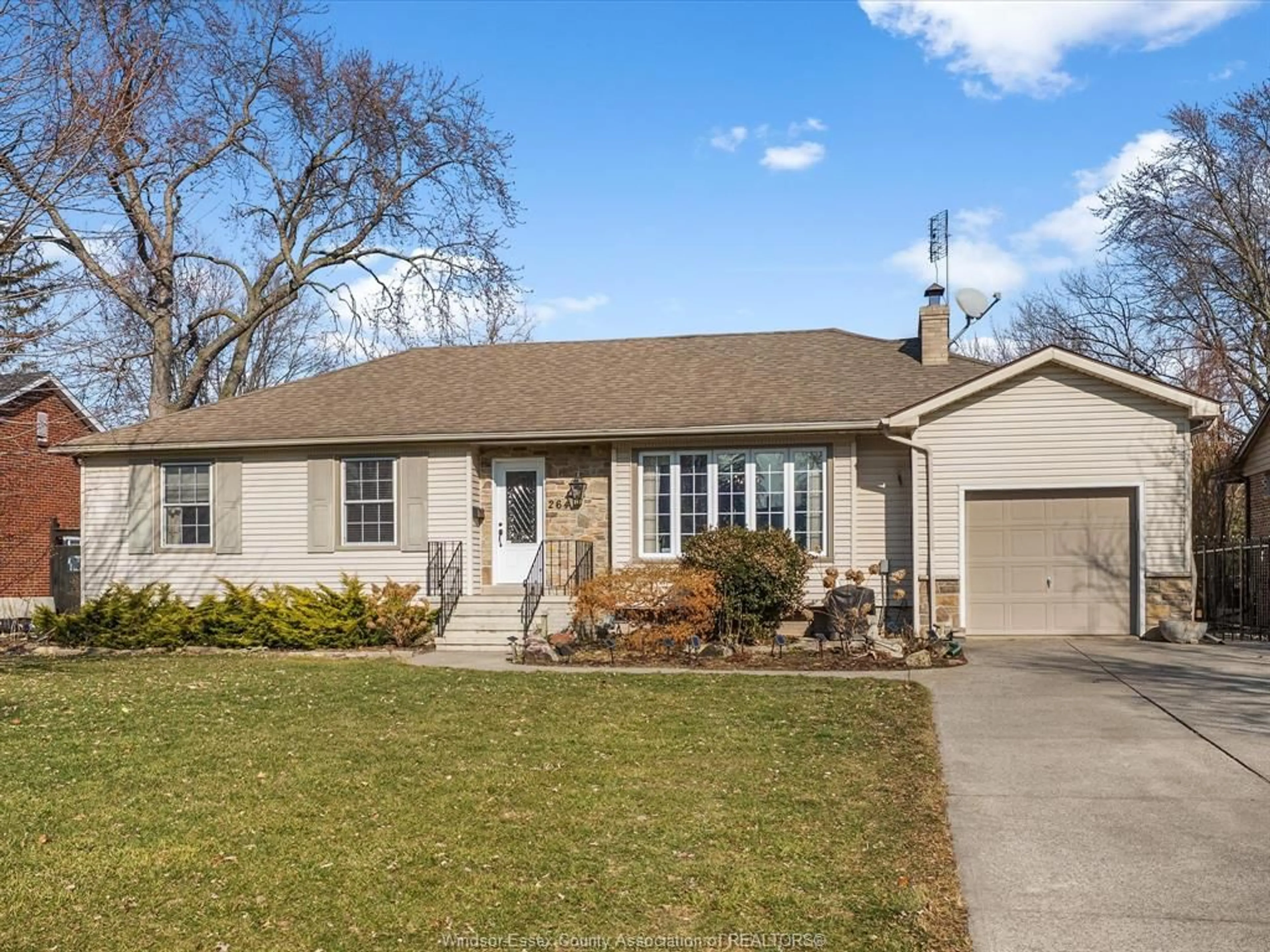 Home with vinyl exterior material, street for 264 PATRICE Dr, Windsor Ontario N8S 2R6