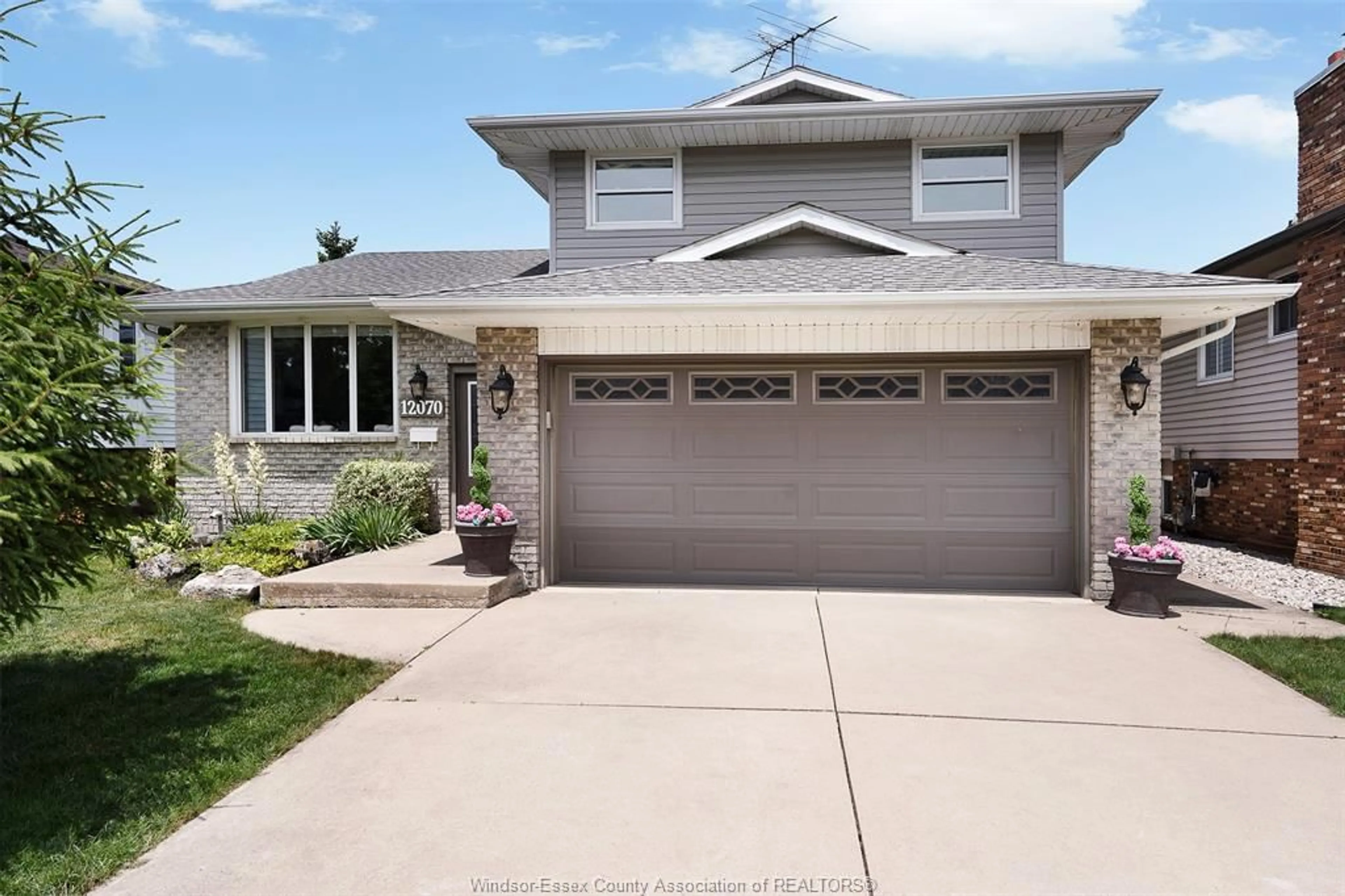 Home with vinyl exterior material, street for 12070 BAILLARGEON, Tecumseh Ontario N8N 3Z9
