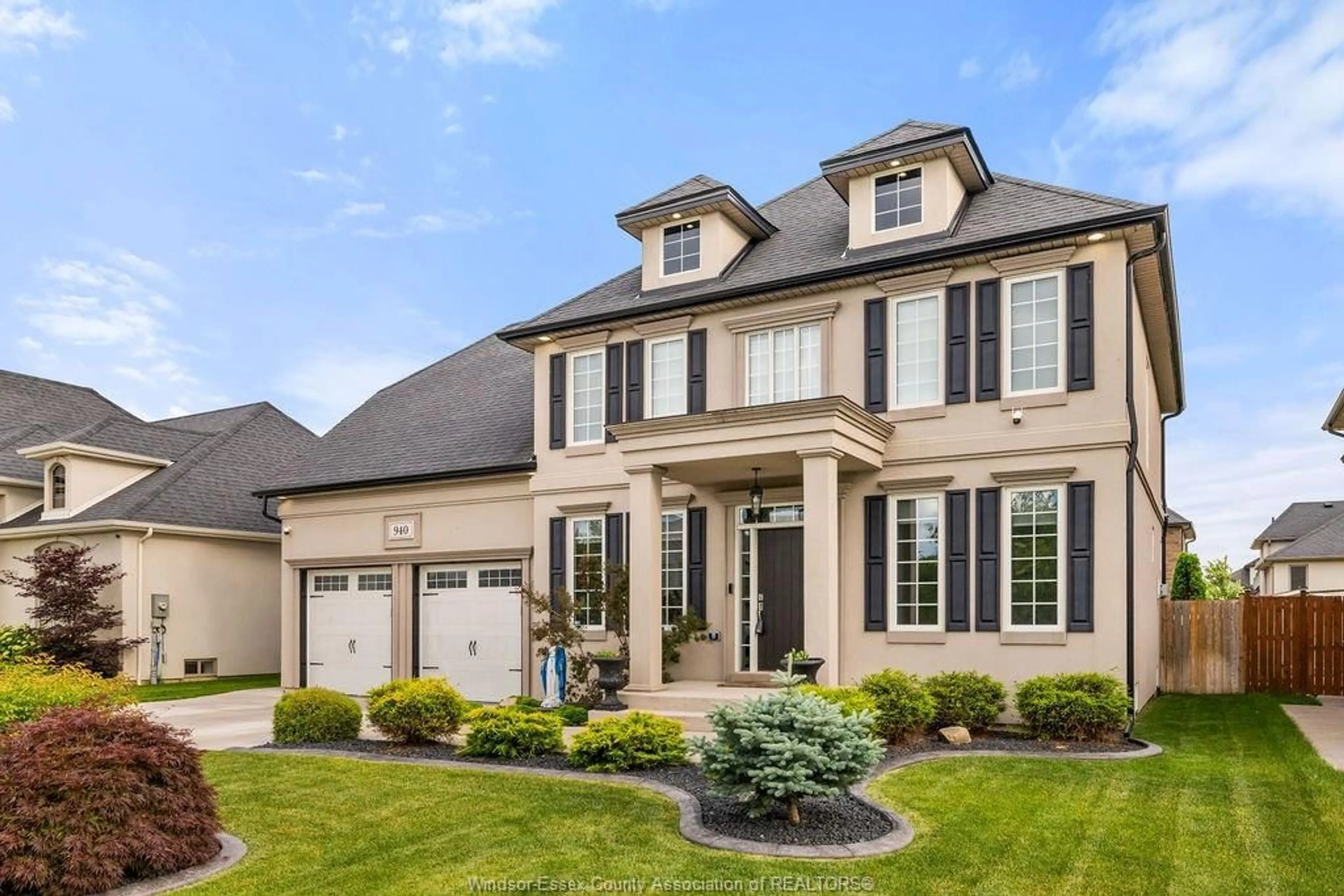 Home with brick exterior material, street for 940 WESTWOOD Dr, Lakeshore Ontario N0R 1A0