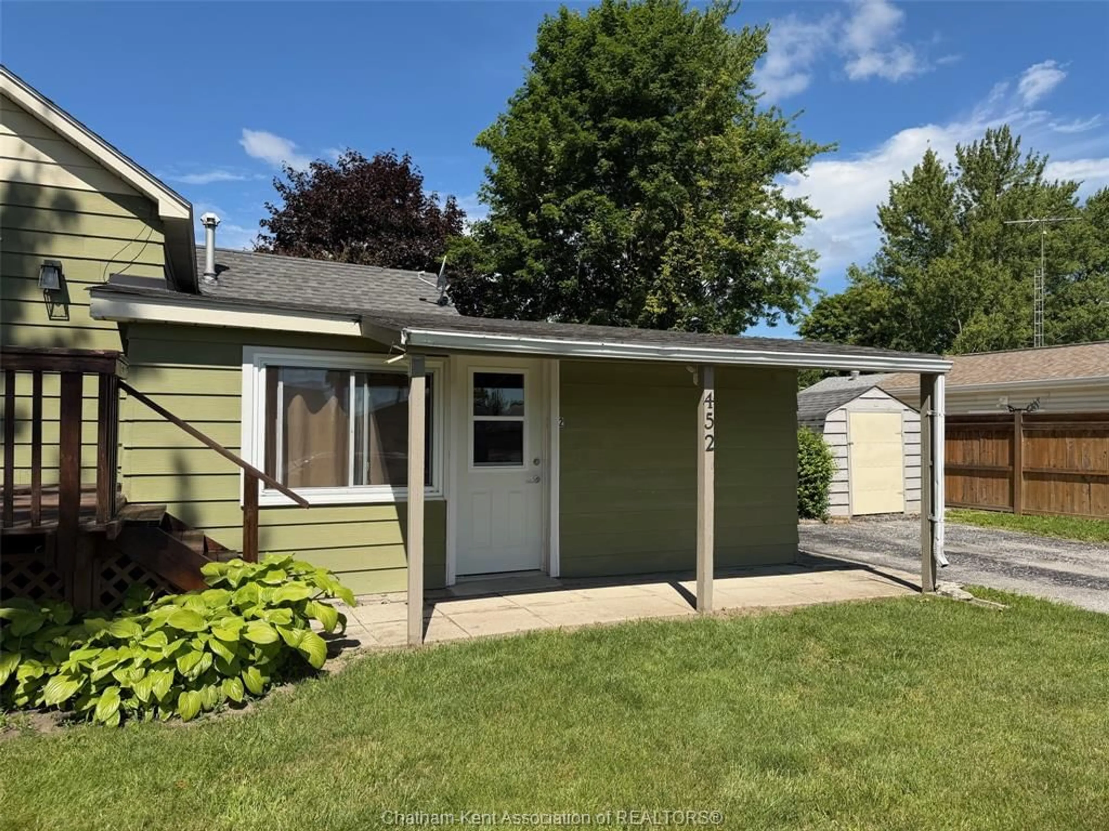 Home with vinyl exterior material, street for 452 John St, Port Lambton Ontario N0P 2B0