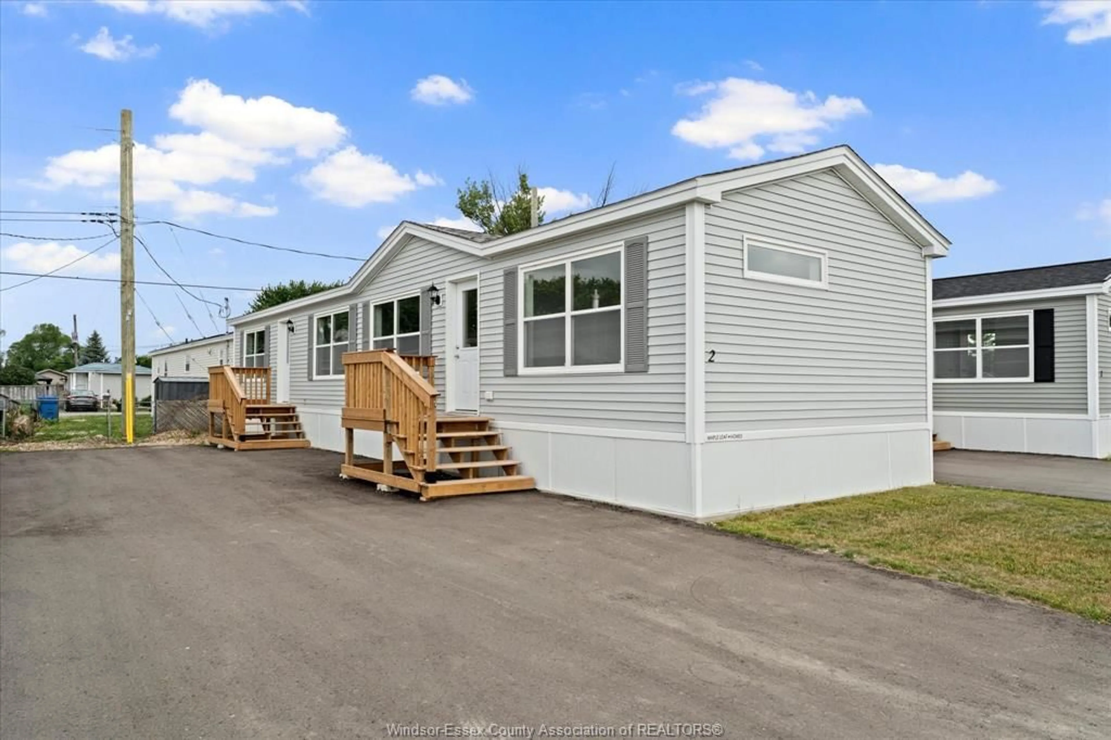 Home with vinyl exterior material, street for 2 LINDA, Lakeshore Ontario N8N 2P4