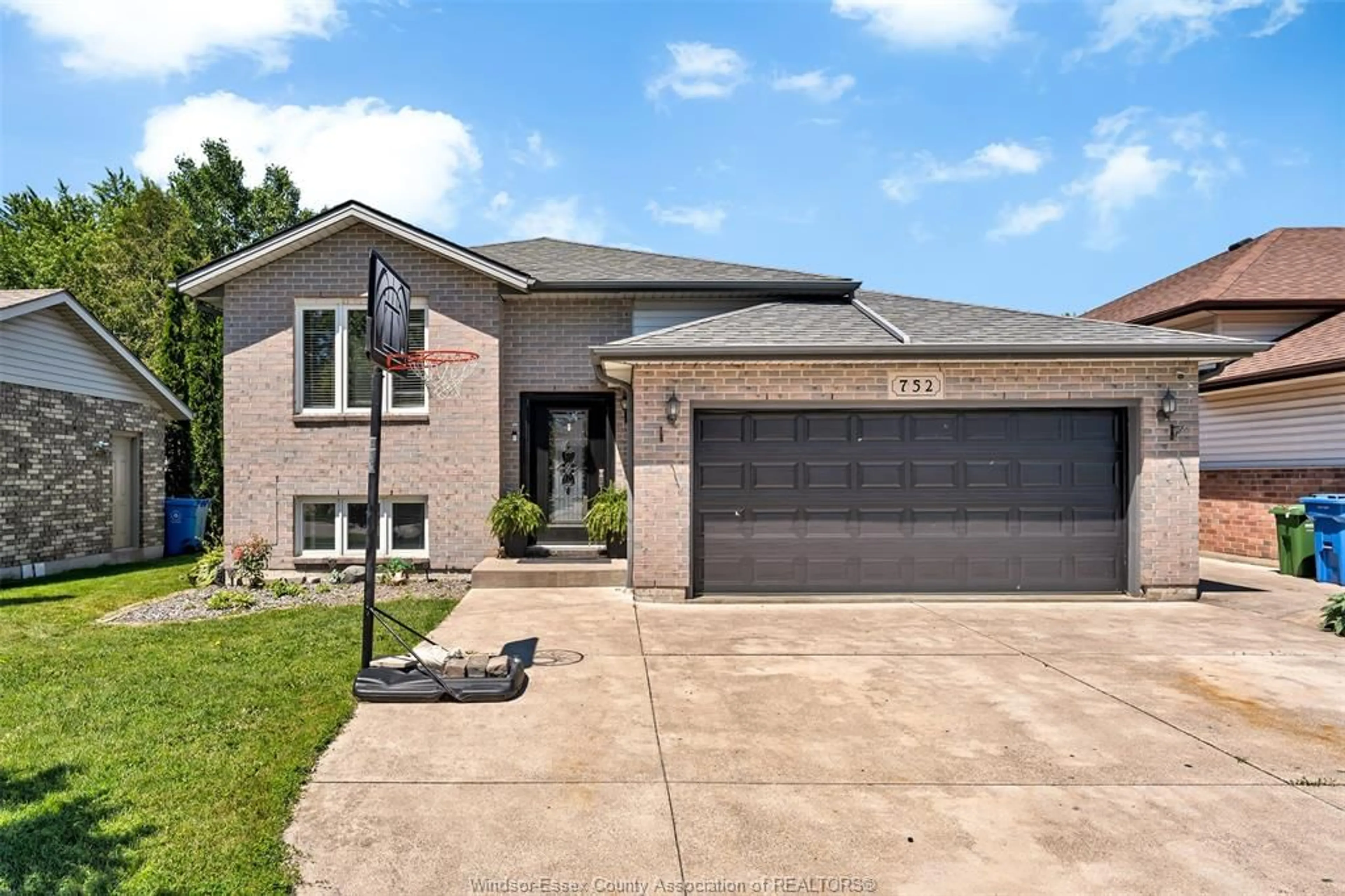 Home with brick exterior material, street for 752 HELENA Cres, Belle River Ontario N8L 0L1
