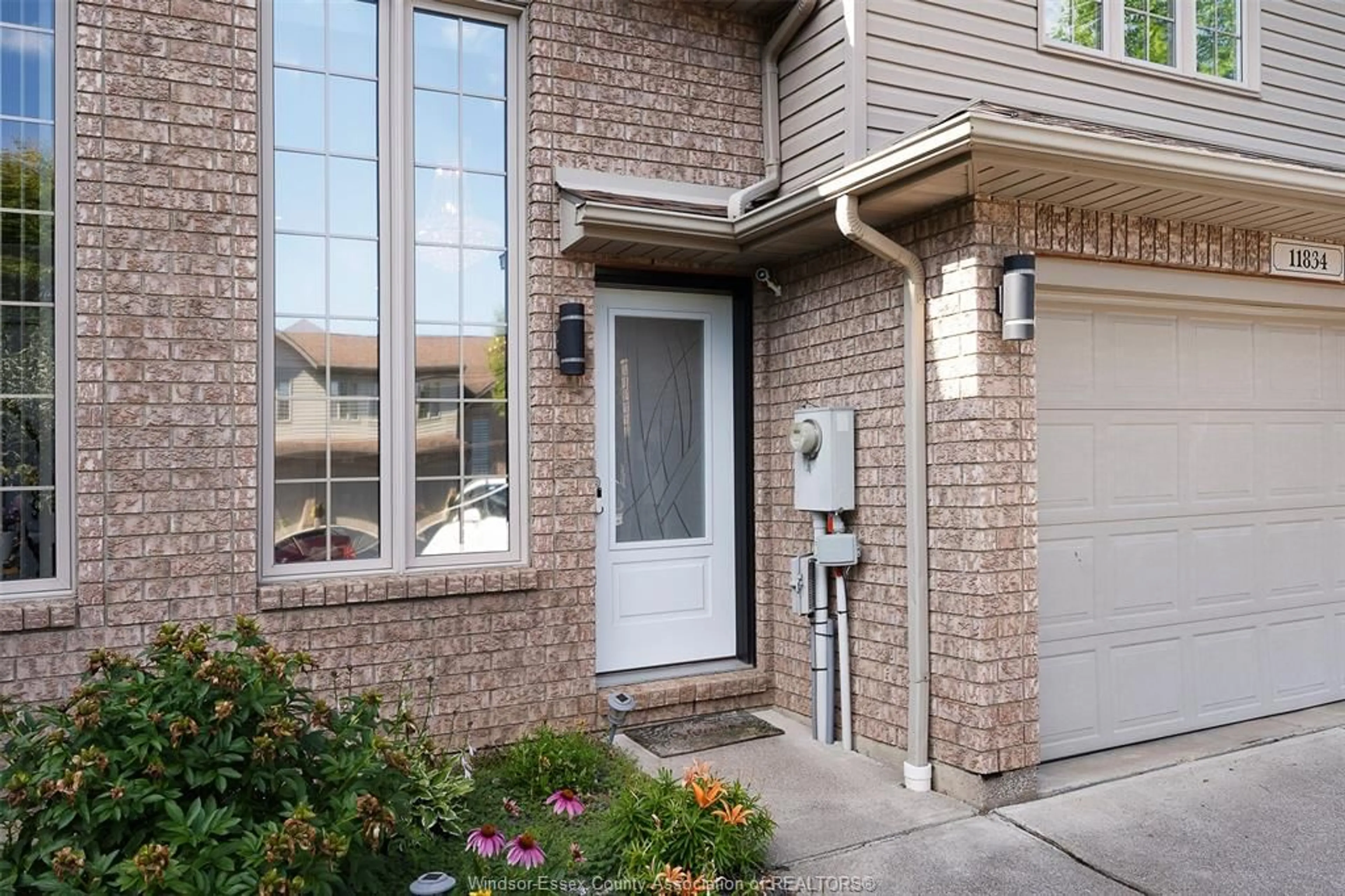 Home with brick exterior material, street for 11834 ROCKLAND, Windsor Ontario N8P 1Z5