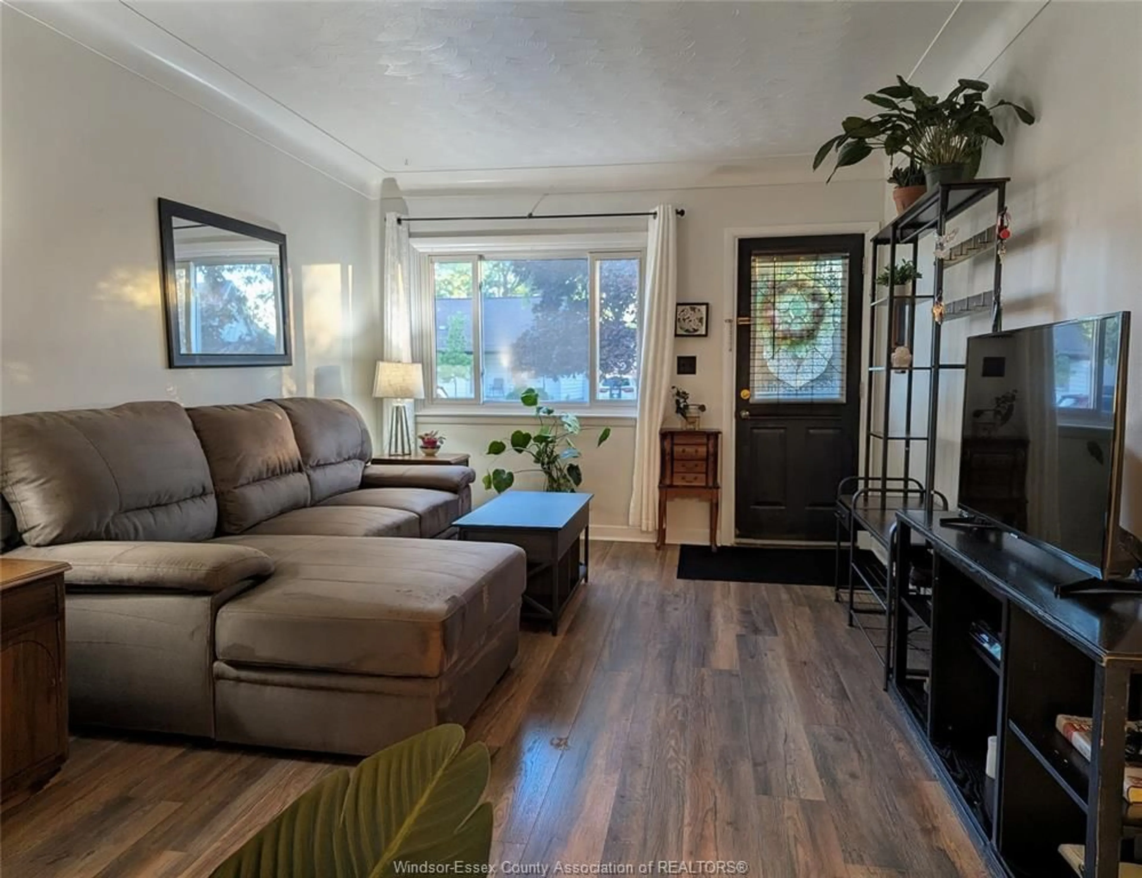 Living room with furniture, wood/laminate floor for 1982 WESTMINSTER, Windsor Ontario N8T 1X6