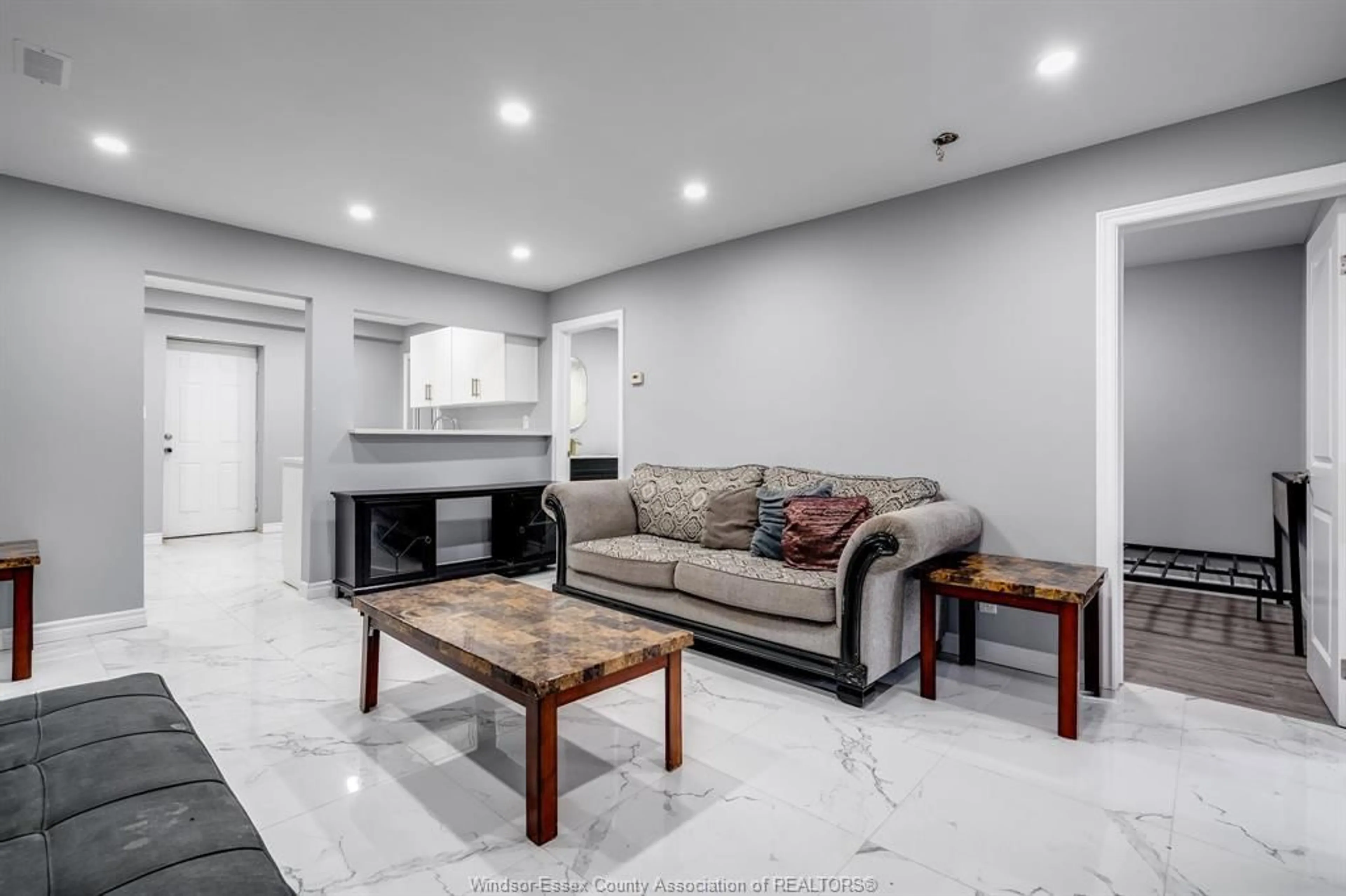 Living room with furniture, ceramic/tile floor for 559 Chatham St, Windsor Ontario N9A 2X2