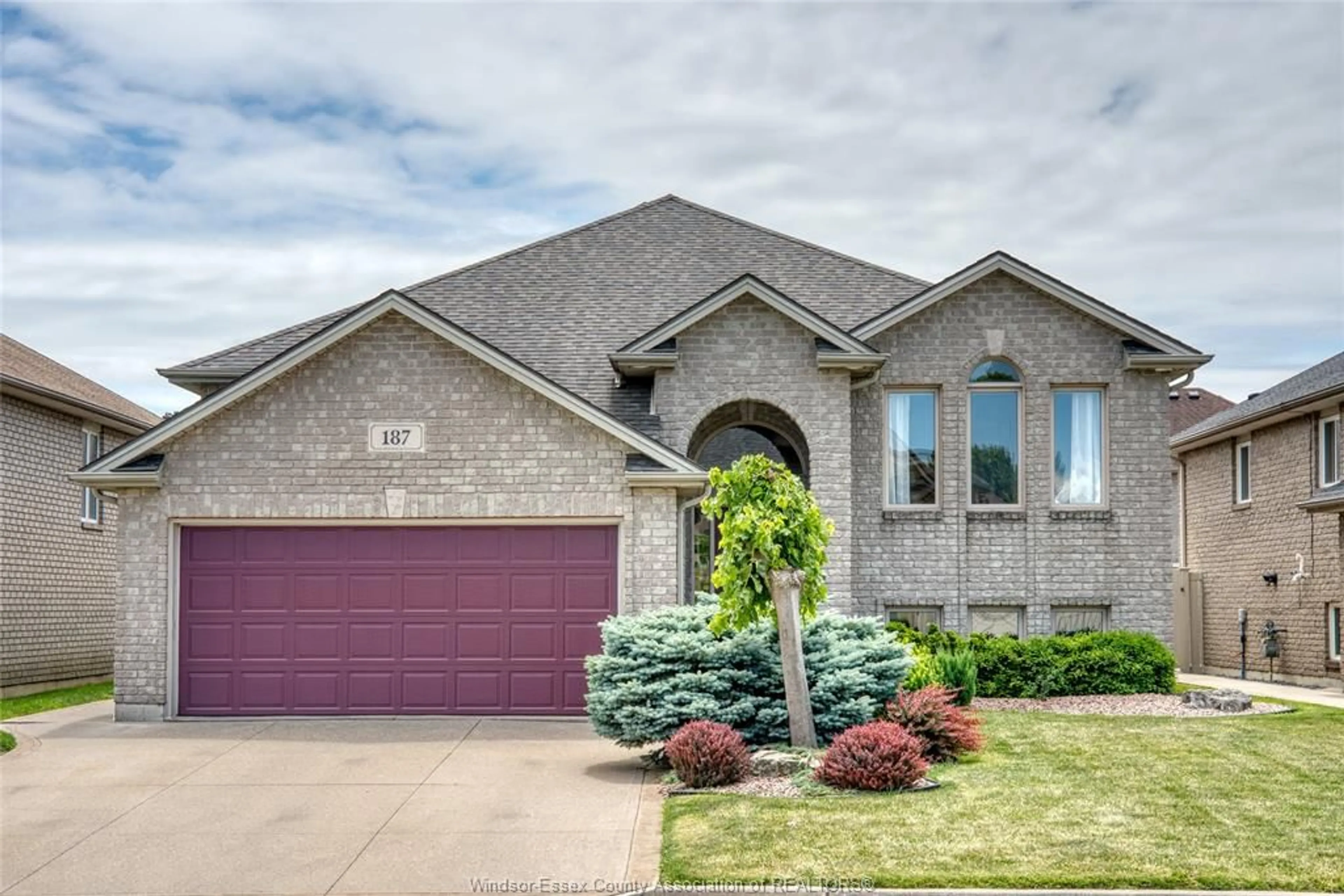 Home with brick exterior material, street for 187 ROCKHAVEN Dr, Lakeshore Ontario N9K 1E9