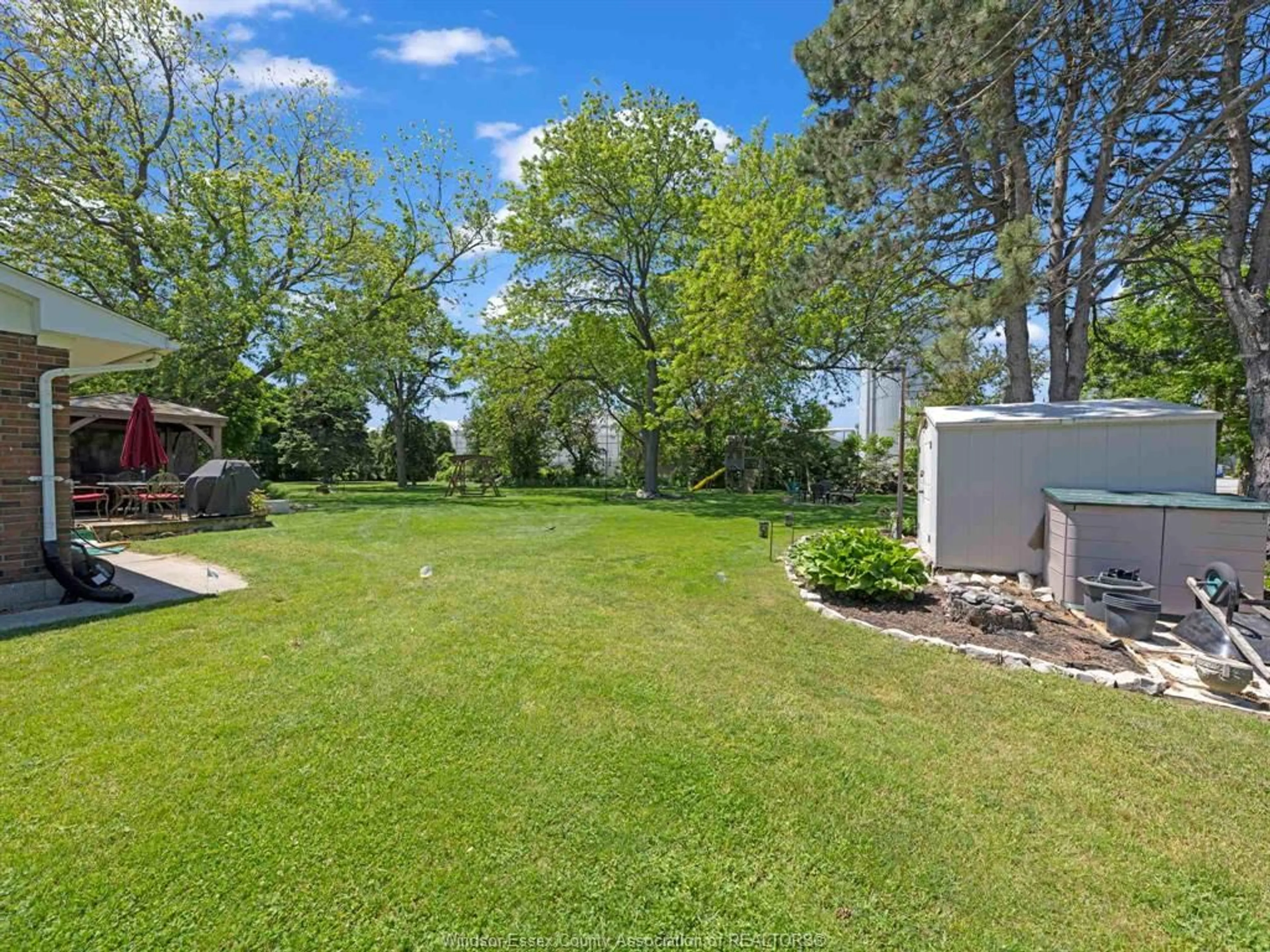 A pic from outside/outdoor area/front of a property/back of a property/a pic from drone, water/lake/river/ocean view for 1517 Redwood Rd, Kingsville Ontario N9Y 2V4
