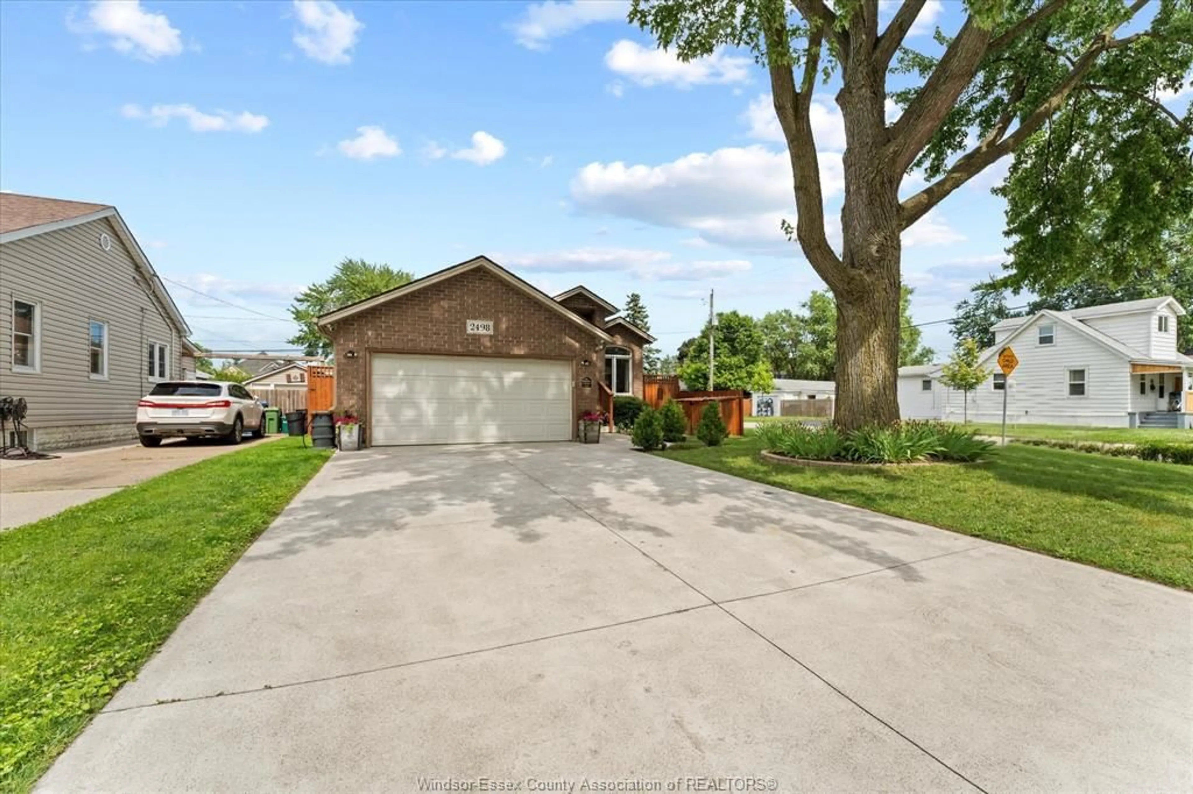A pic from outside/outdoor area/front of a property/back of a property/a pic from drone, street for 2498 BERNARD, Windsor Ontario N8W 4S1