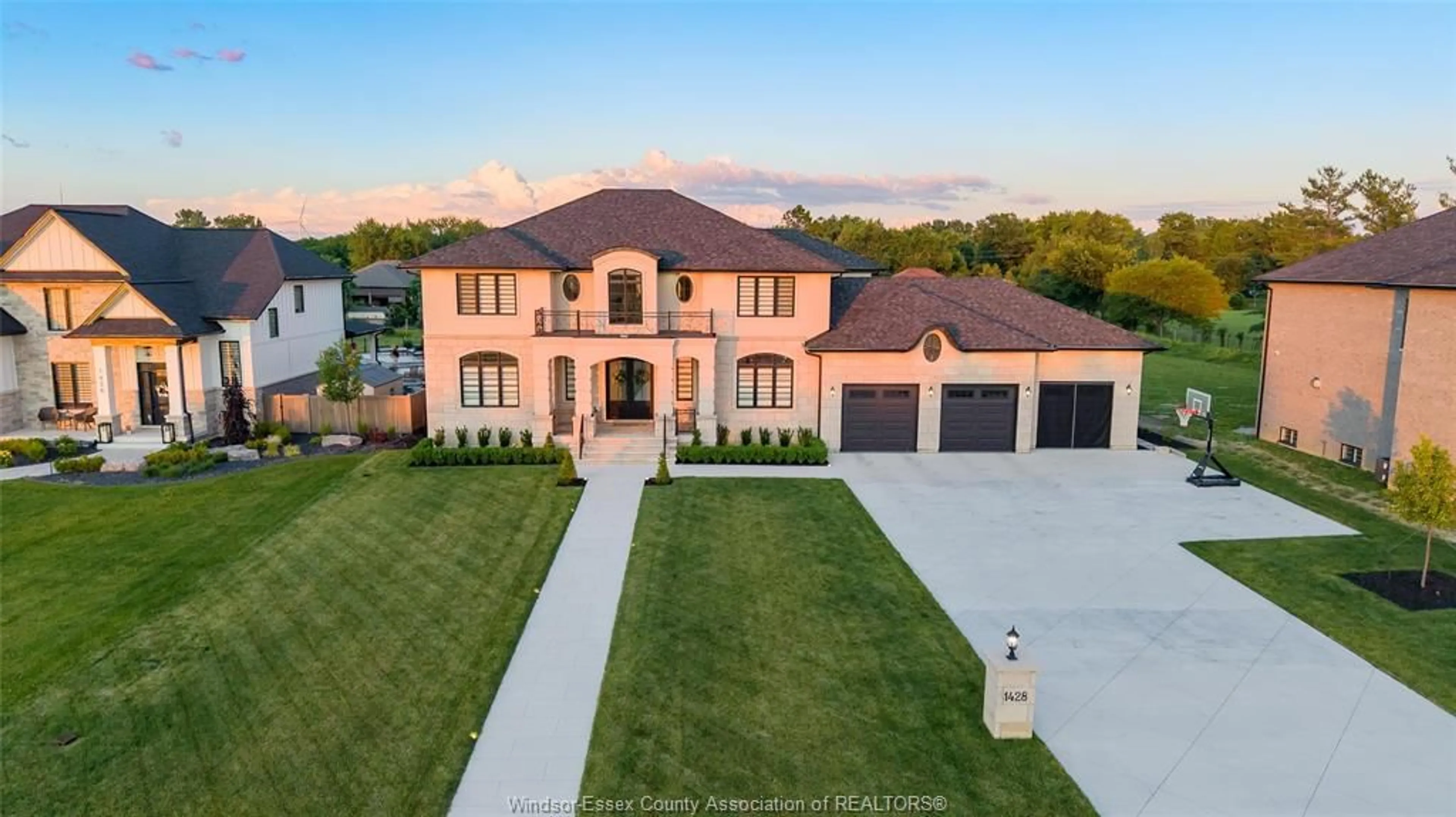 A pic from outside/outdoor area/front of a property/back of a property/a pic from drone, street for 1428 MULLINS, Lakeshore Ontario N0R 1V0