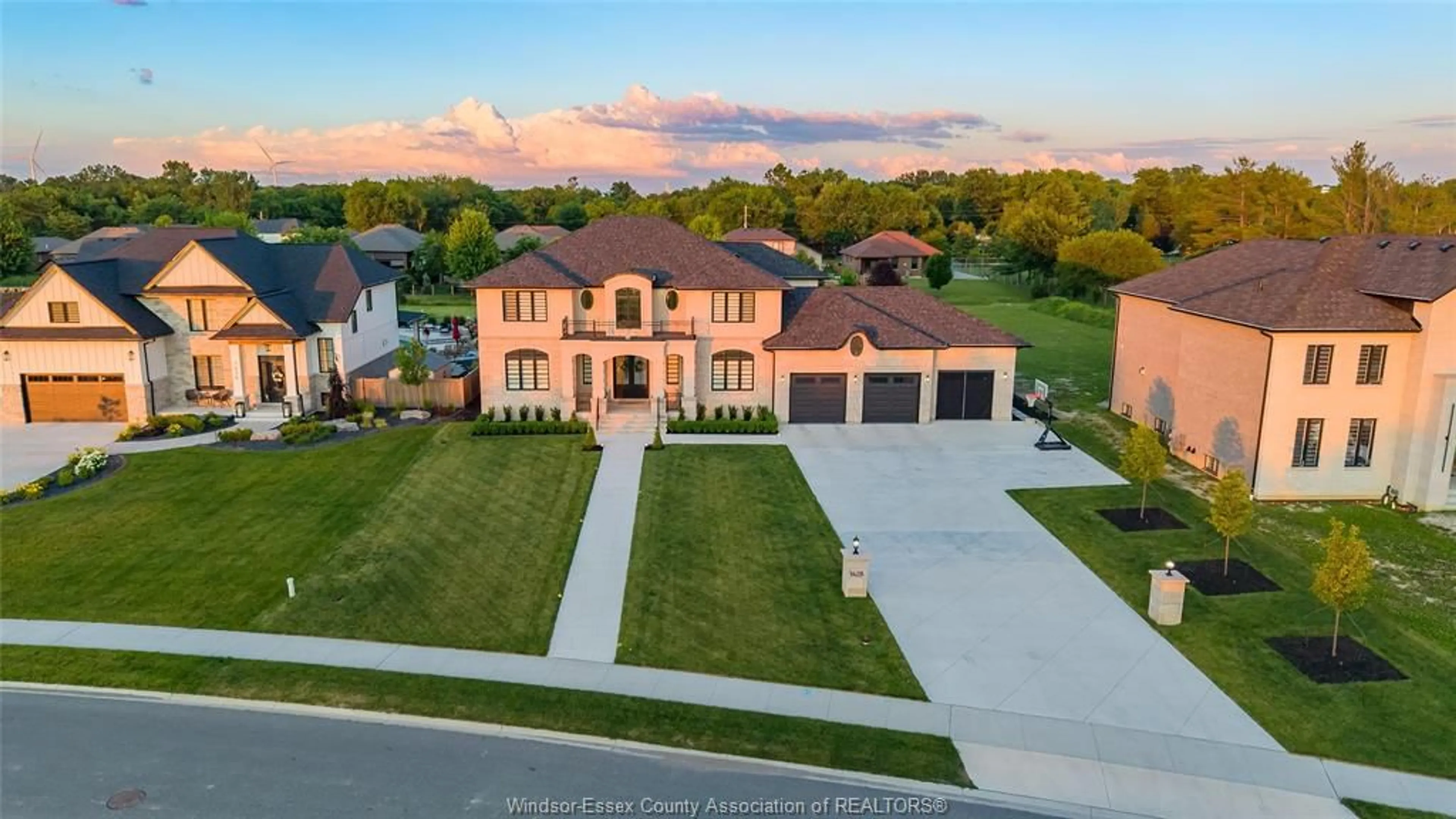 A pic from outside/outdoor area/front of a property/back of a property/a pic from drone, street for 1428 MULLINS, Lakeshore Ontario N0R 1V0