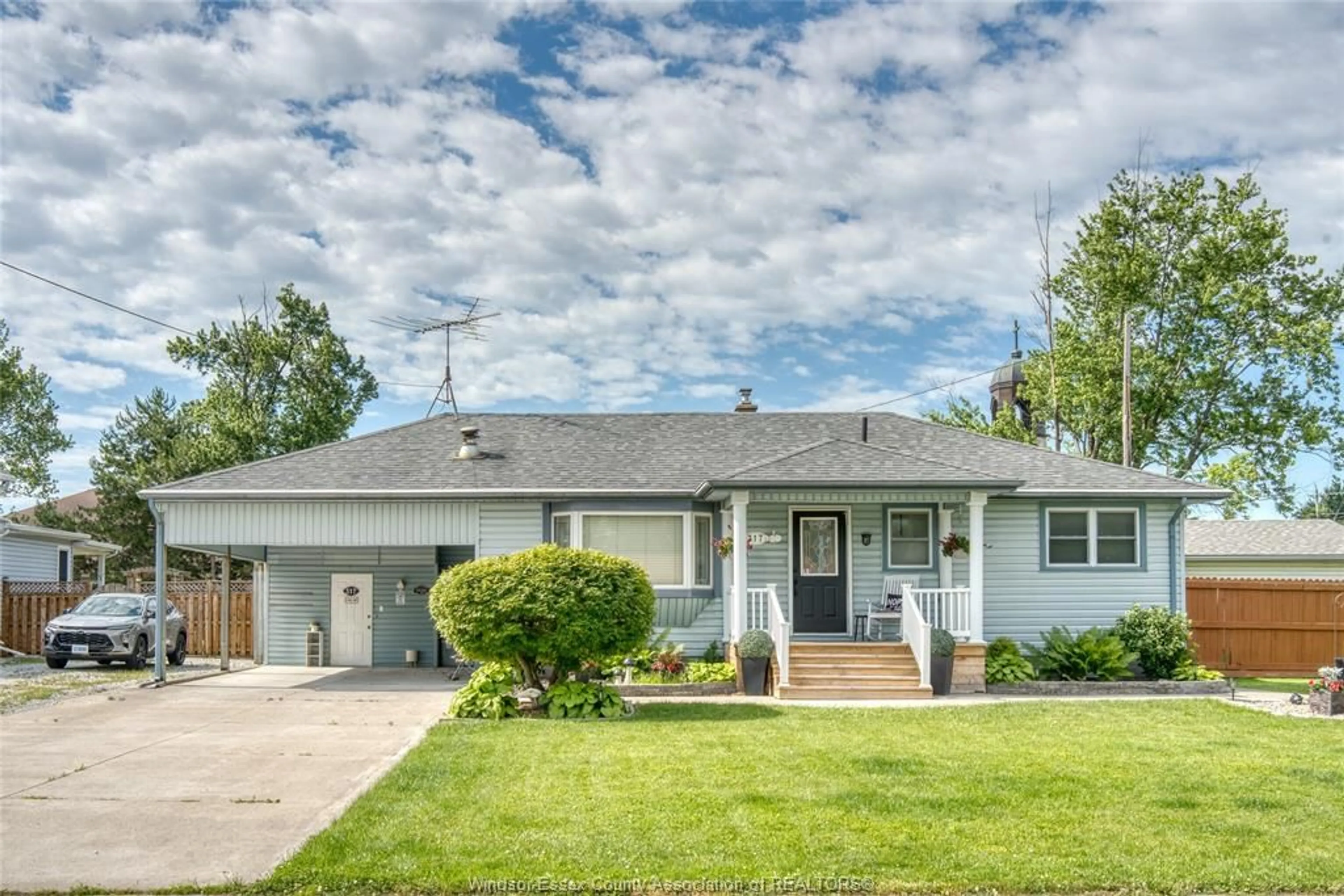 Home with vinyl exterior material, street for 317 PARKSIDE Dr, McGregor Ontario N0R 1J0