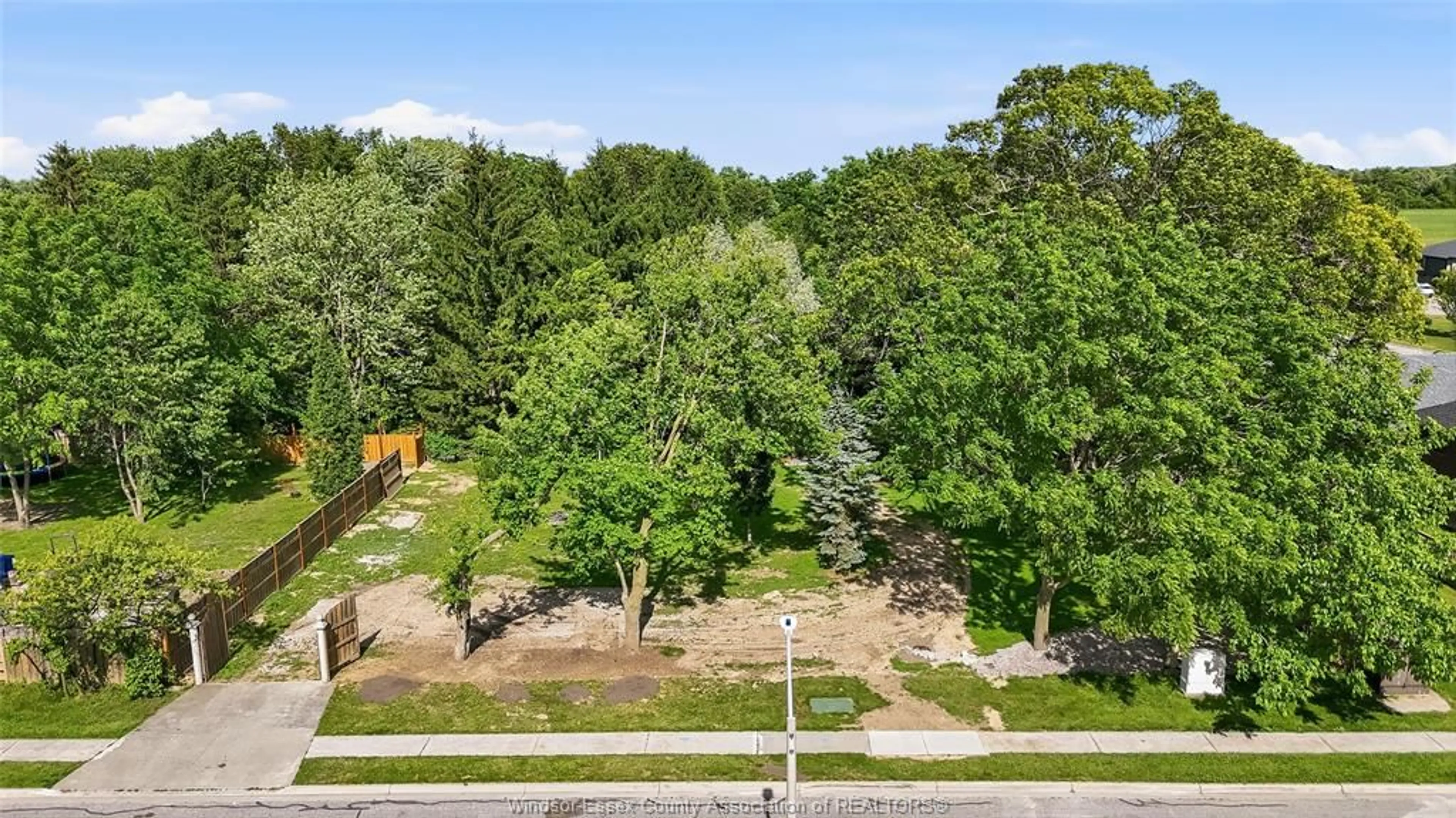 A pic from outside/outdoor area/front of a property/back of a property/a pic from drone, forest/trees view for V/L CONSERVATION Blvd, Kingsville Ontario N9Y 3Z1